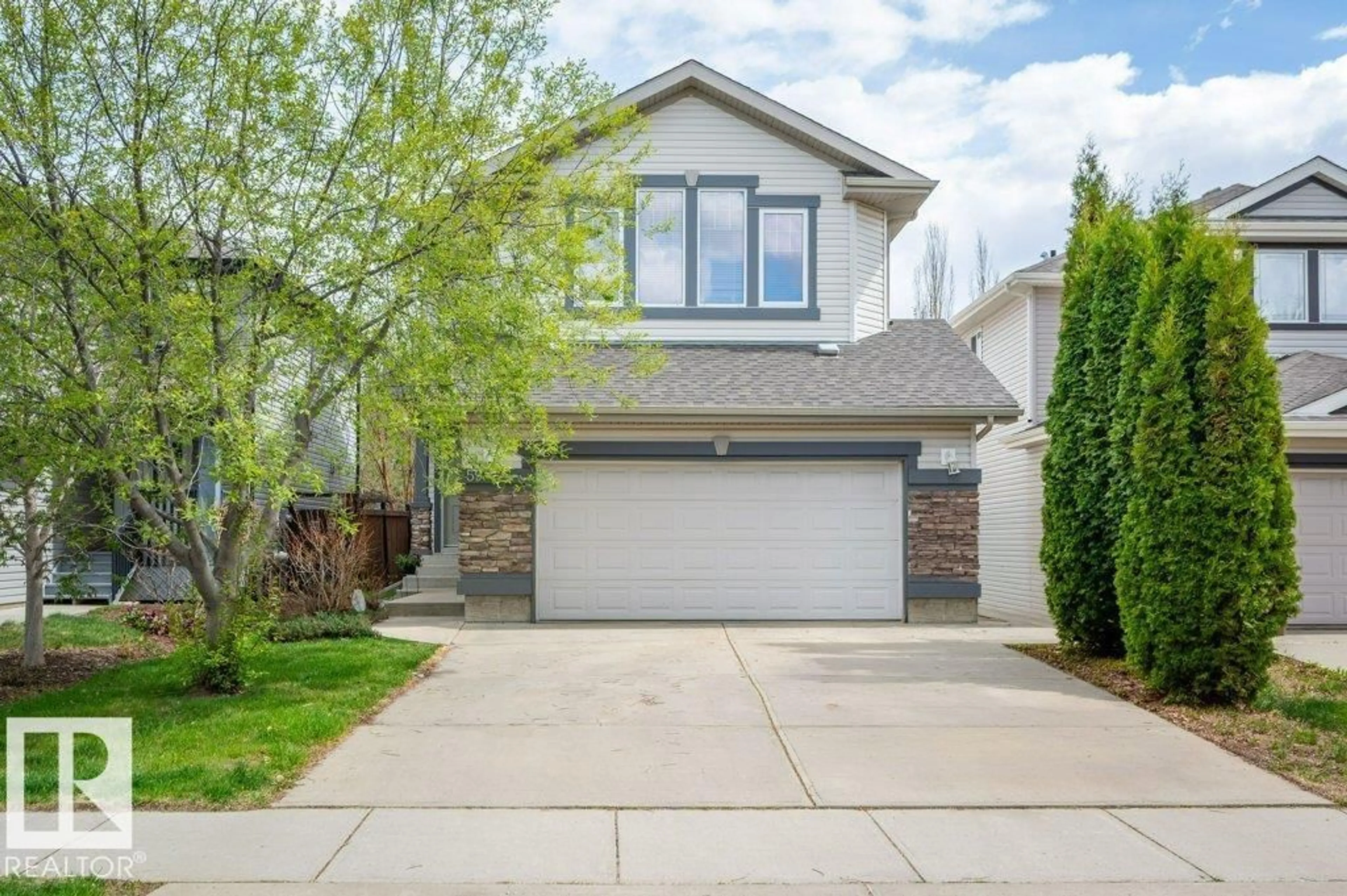 Home with vinyl exterior material, street for 59 NADINE WY, St. Albert Alberta T8N3Y9