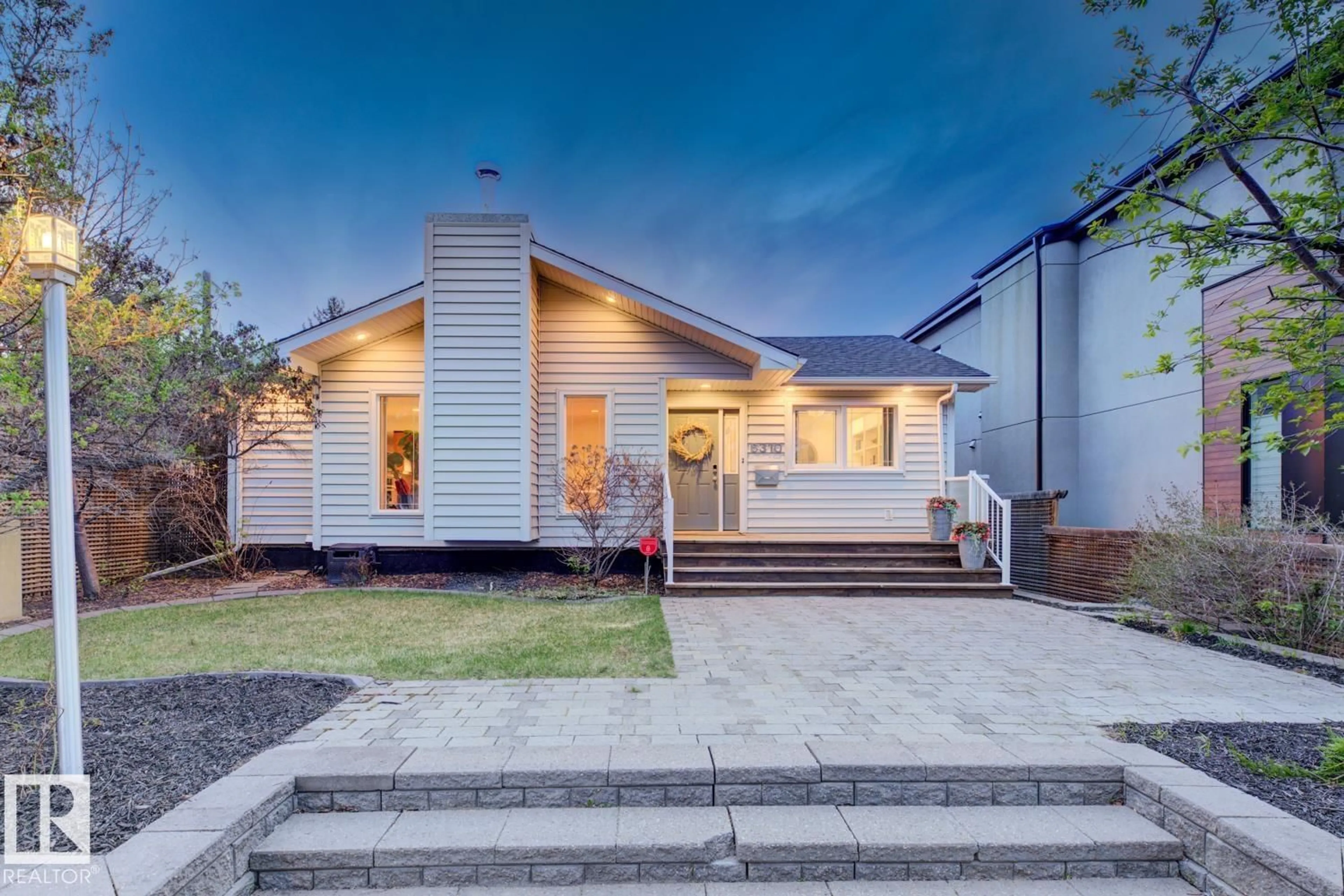 Home with vinyl exterior material, street for 6310 109A ST NW, Edmonton Alberta T6H3C7