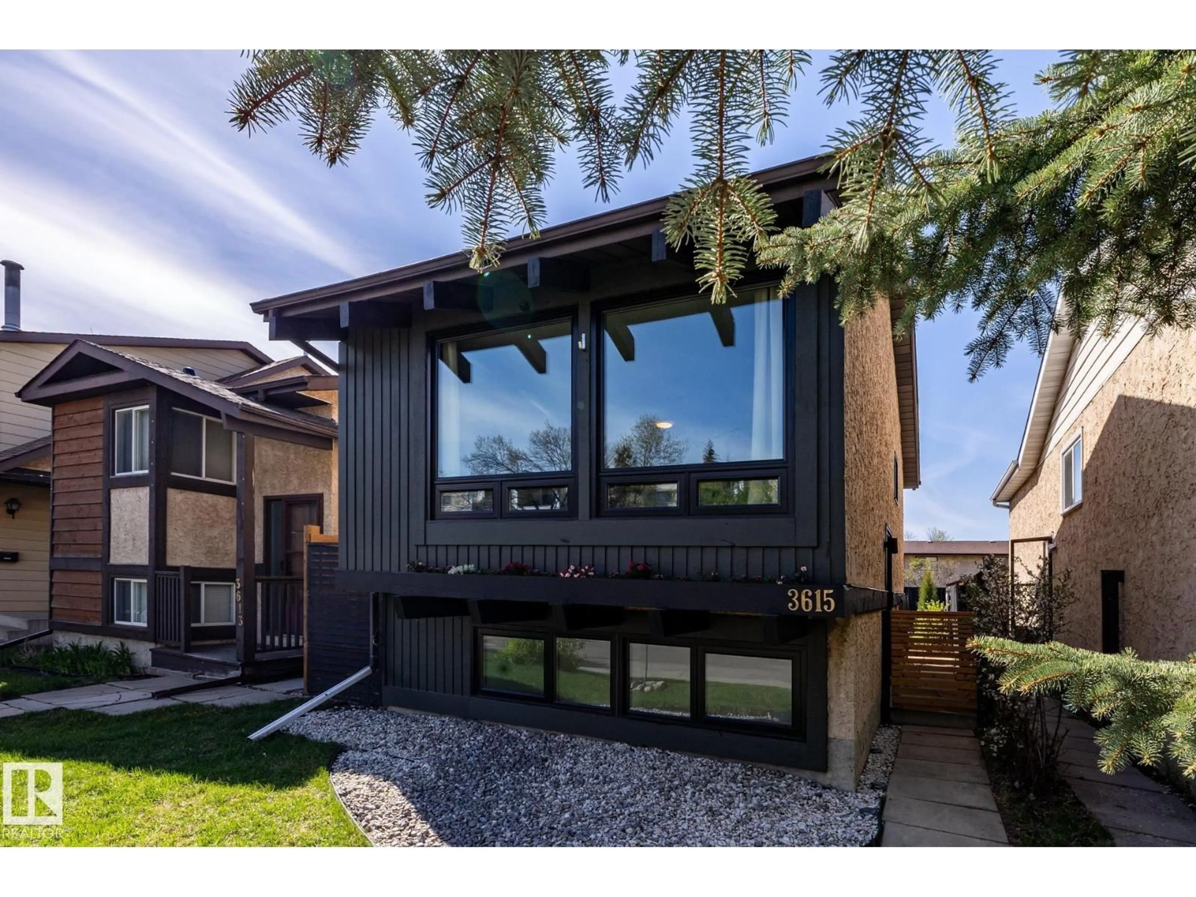 Home with vinyl exterior material, street for 3615 43 AV, Edmonton Alberta T5L4J5