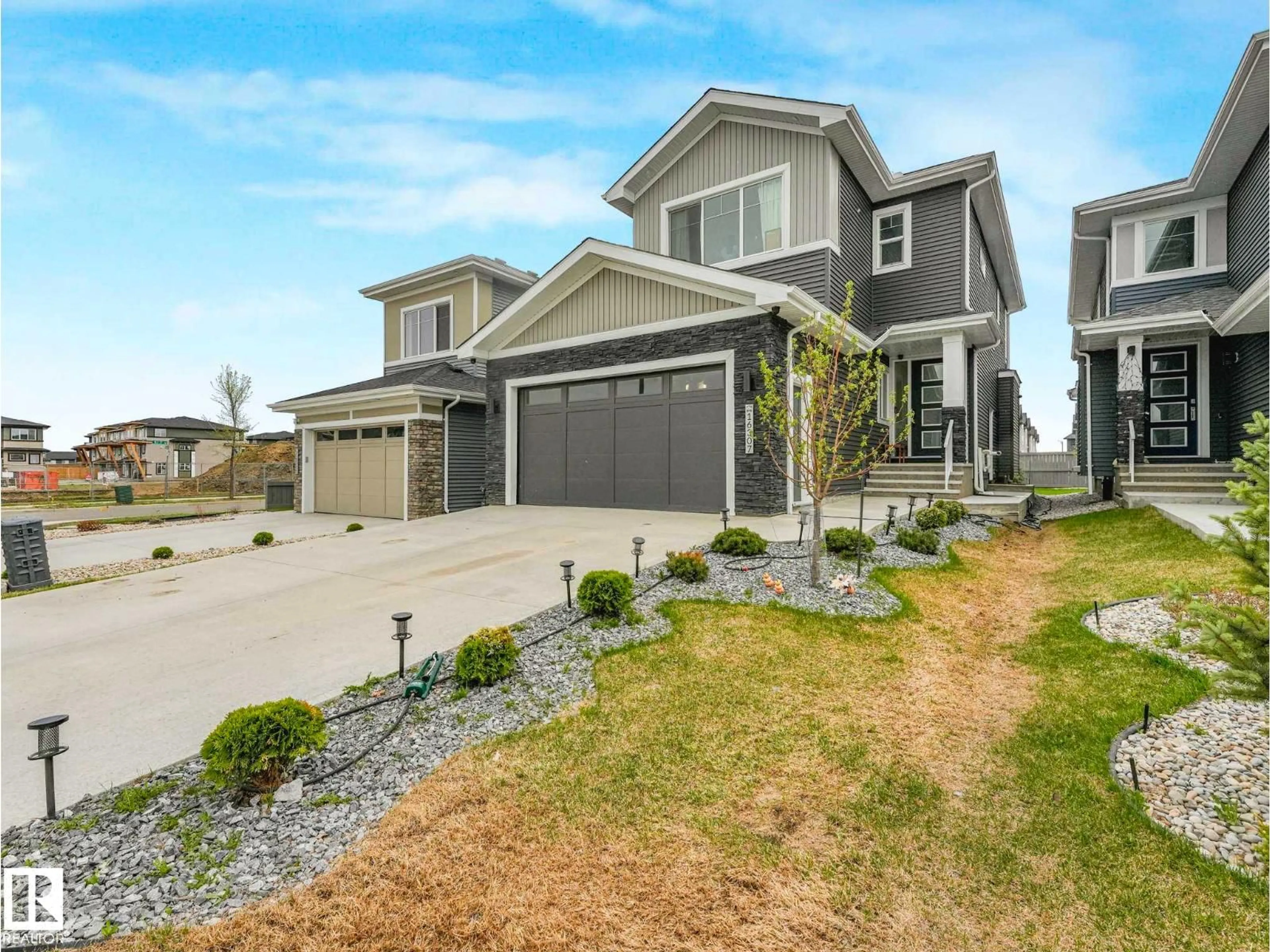Home with vinyl exterior material, street for SW - 16307 19 AV, Edmonton Alberta T6W5J8