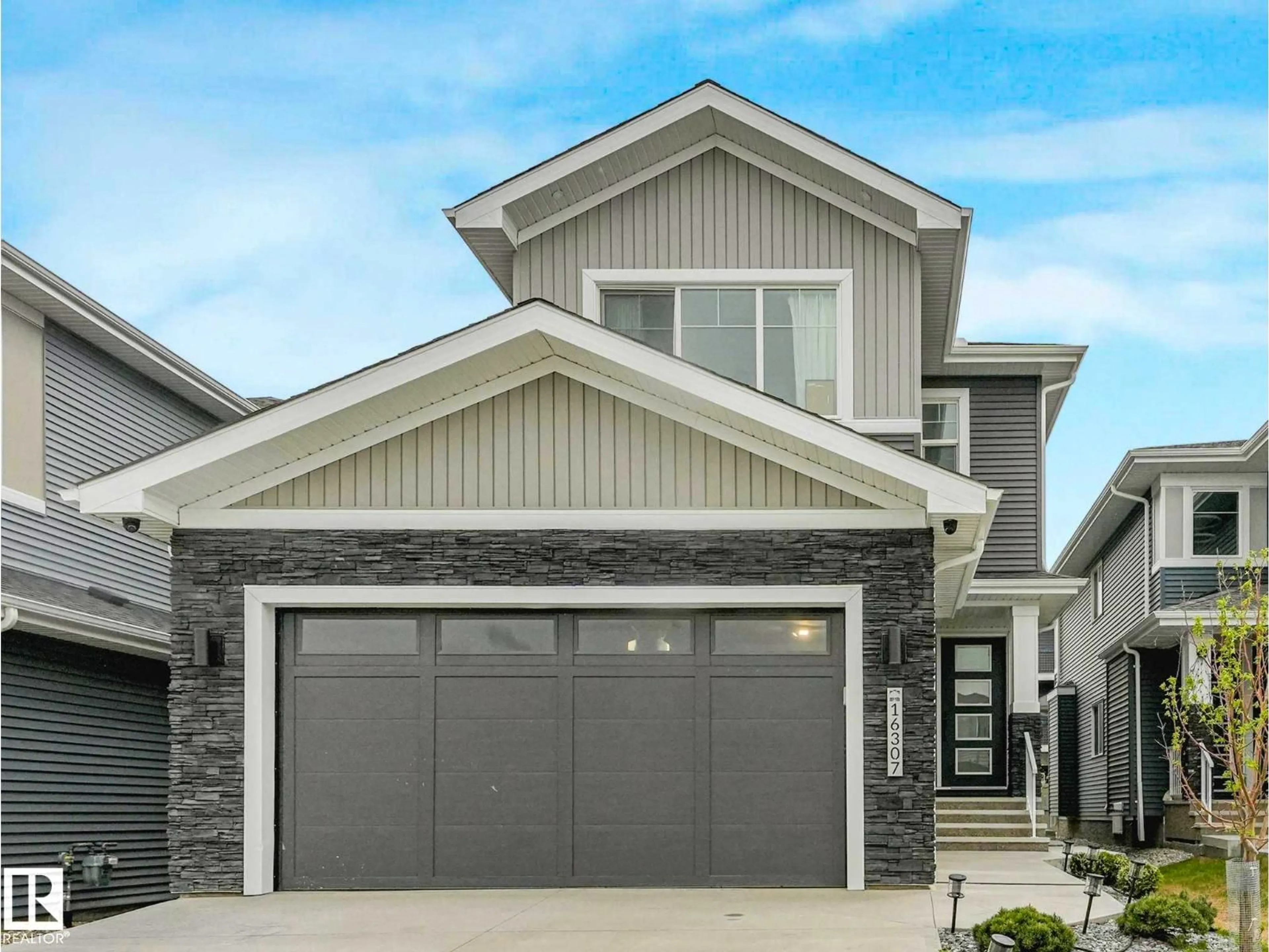 Home with vinyl exterior material, street for SW - 16307 19 AV, Edmonton Alberta T6W5J8