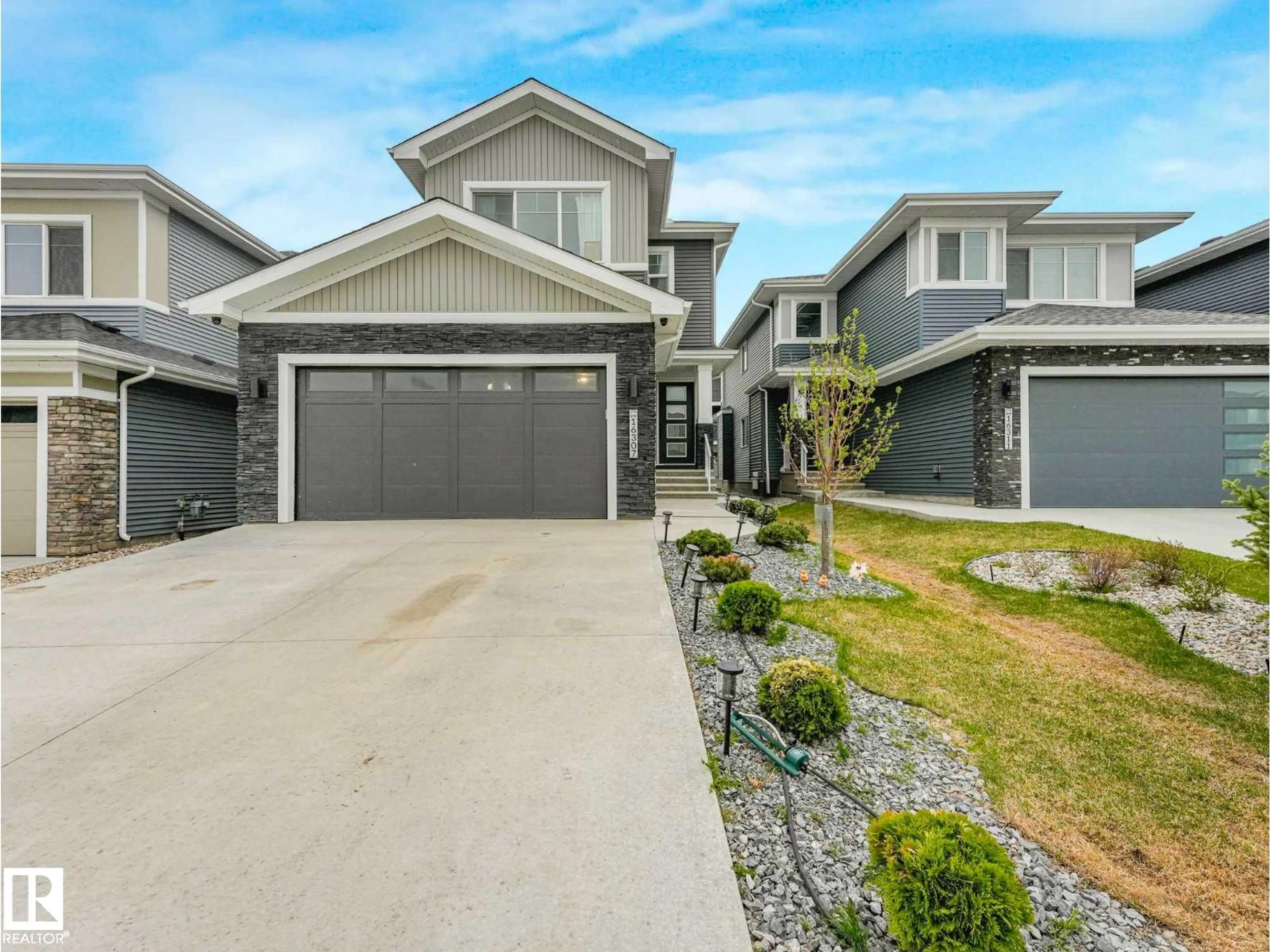 Home with vinyl exterior material, street for SW - 16307 19 AV, Edmonton Alberta T6W5J8