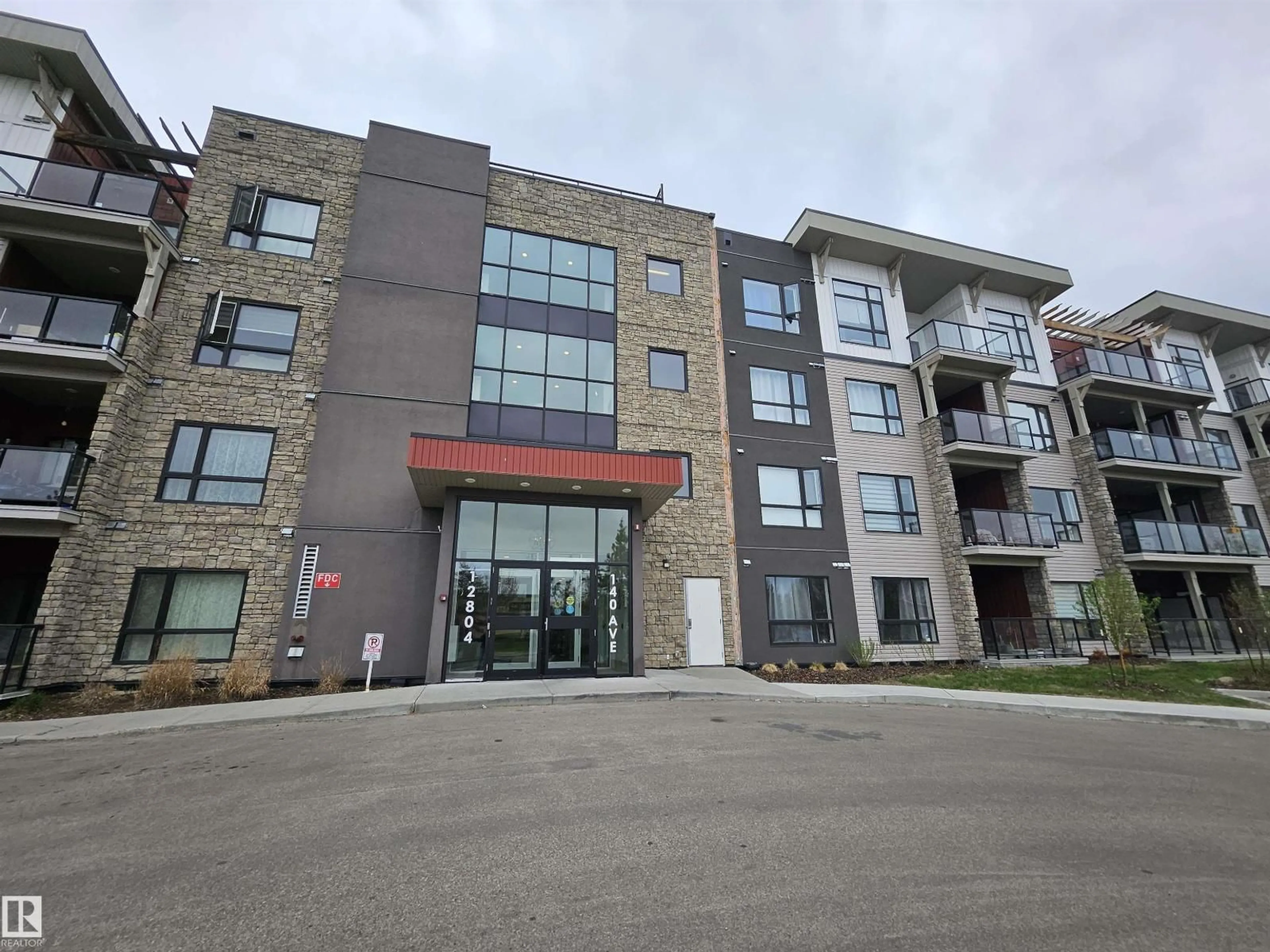 A pic from outside/outdoor area/front of a property/back of a property/a pic from drone, building for 127 - 12804 140 AV, Edmonton Alberta T6V0M3
