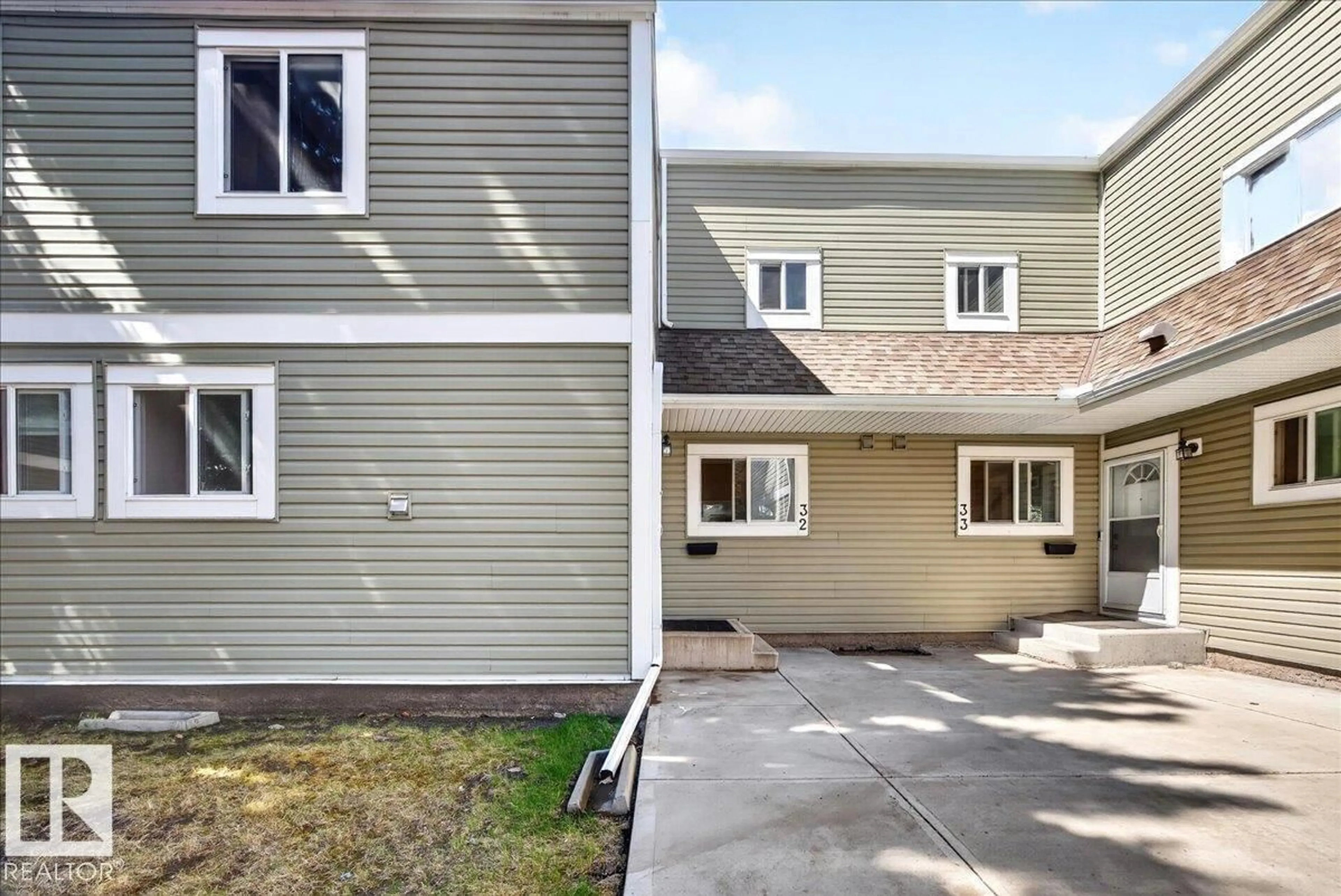 Home with vinyl exterior material, street for #32 - 1820 56 ST, Edmonton Alberta T6L5L4