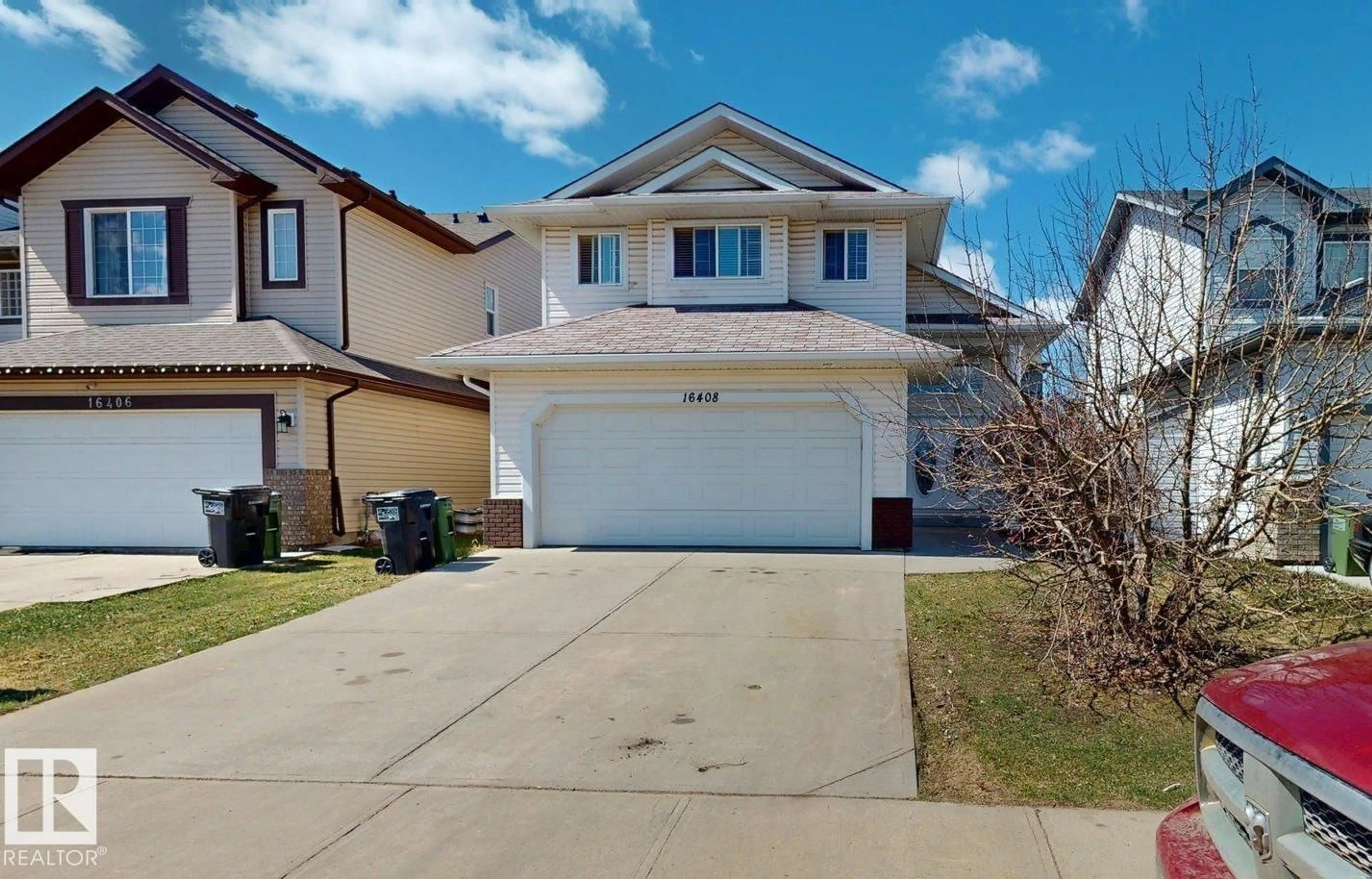 Home with vinyl exterior material, street for 16408 49 ST NW, Edmonton Alberta T5Y0A5
