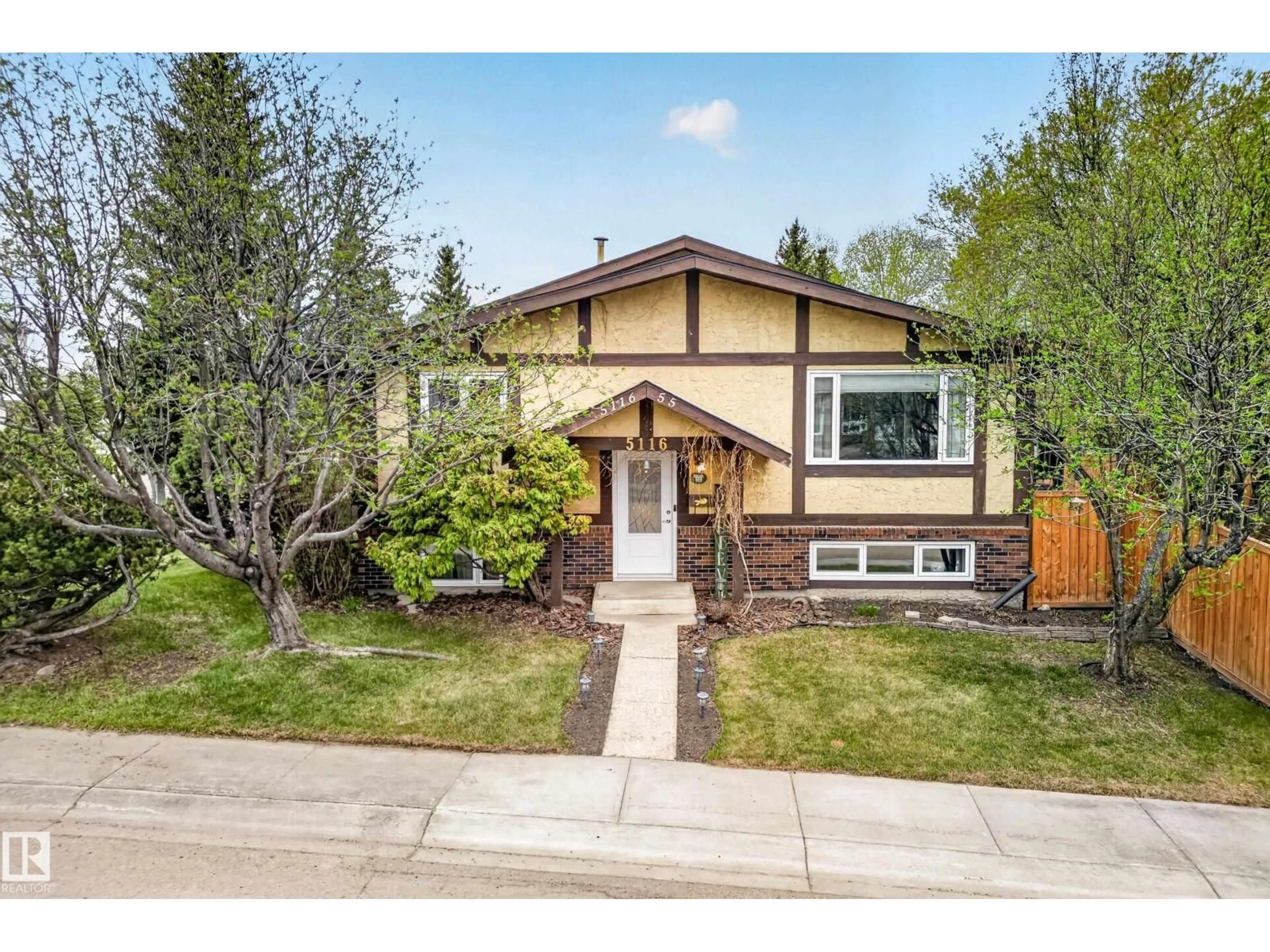 Home with vinyl exterior material, street for 5116 55 ST, Beaumont Alberta T4X1E1