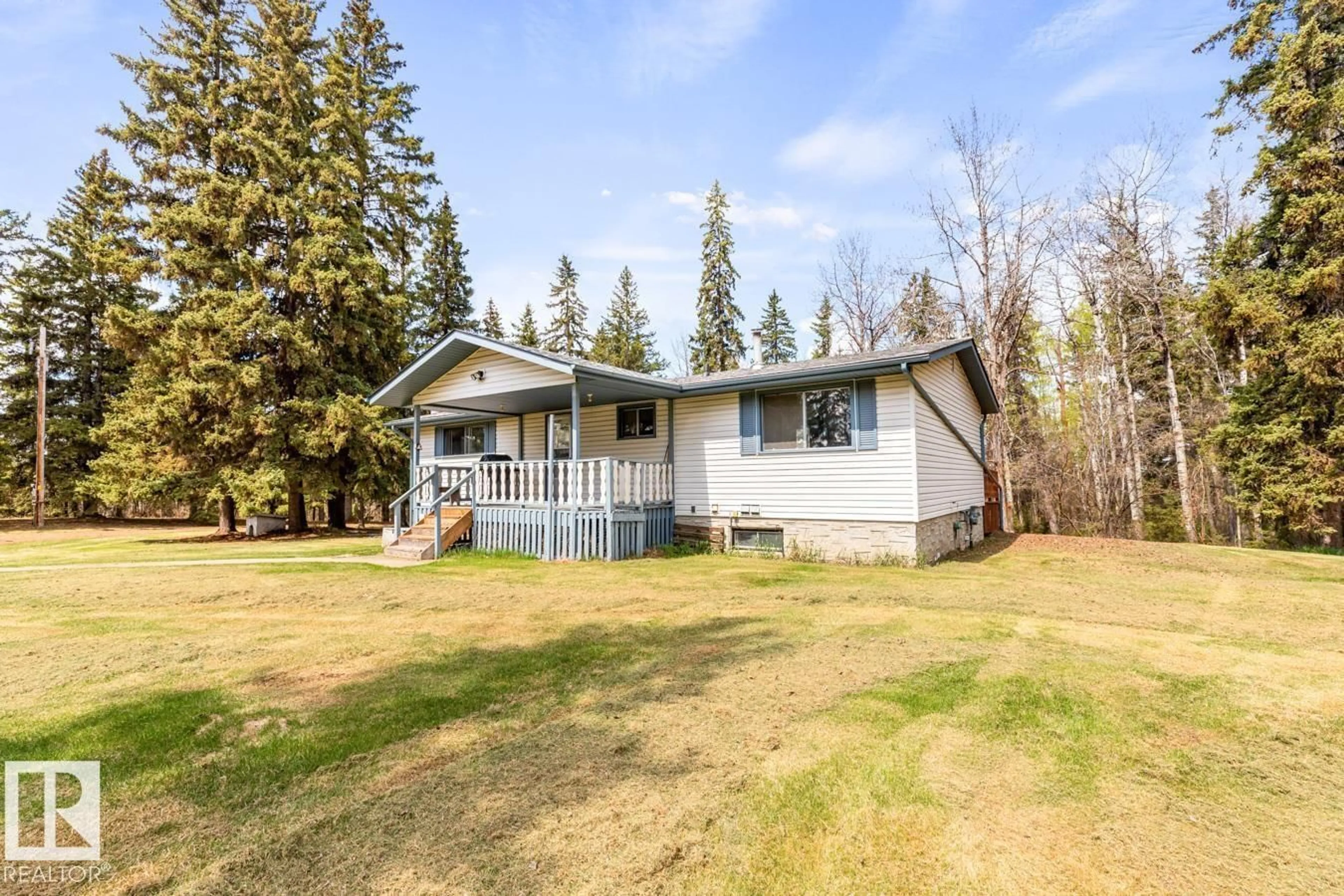 A pic from outside/outdoor area/front of a property/back of a property/a pic from drone, unknown for 510 - 23049 TWP RD, Rural Leduc County Alberta T0B3M1