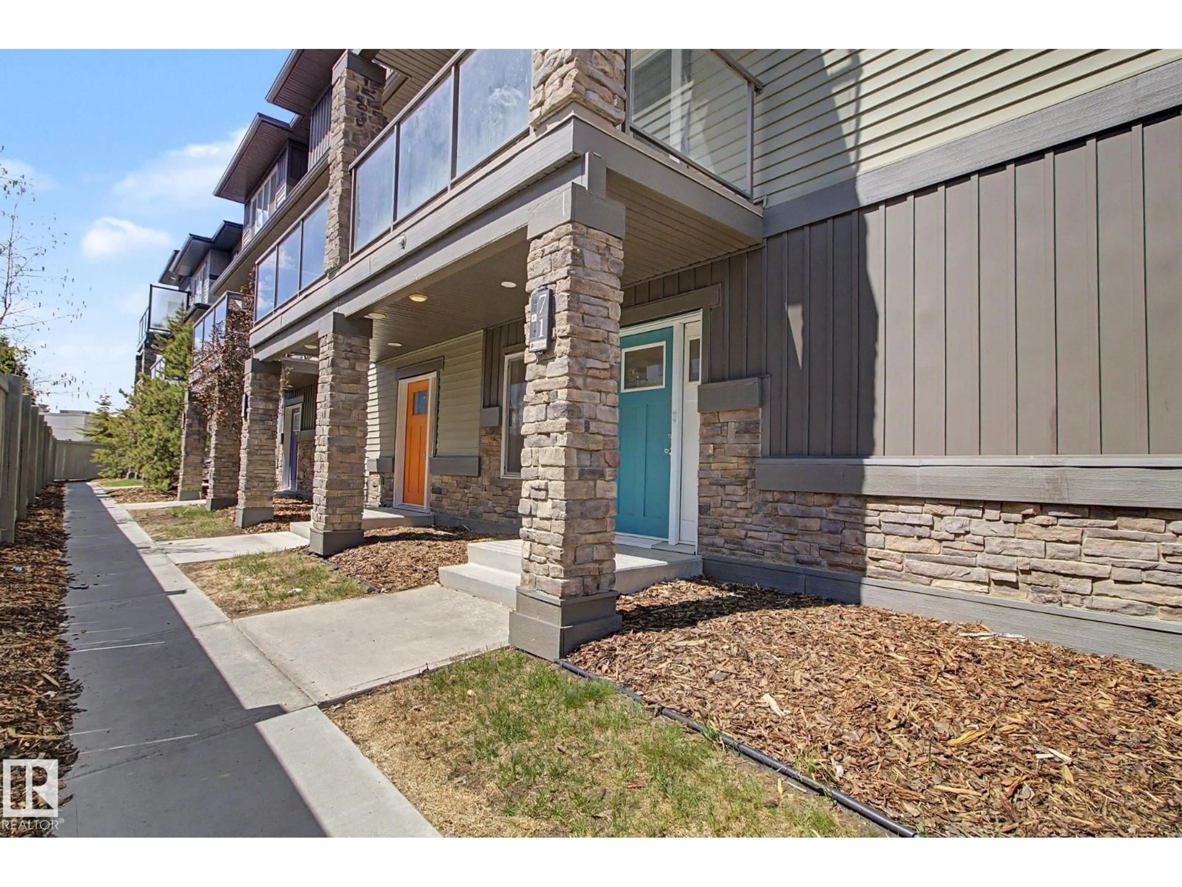 Home with brick exterior material, street for 1530 - 71 TAMARACK BV, Edmonton Alberta T6T2E6