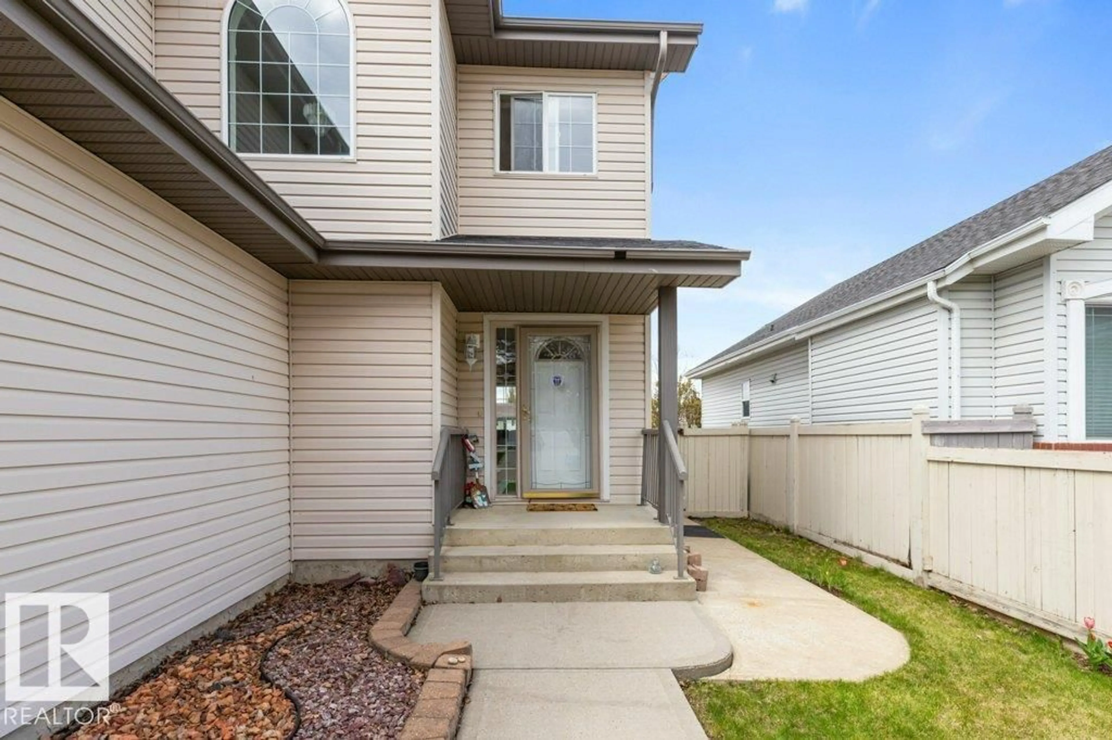 Home with vinyl exterior material, street for NW - 1346 118A ST, Edmonton Alberta T6J7G2