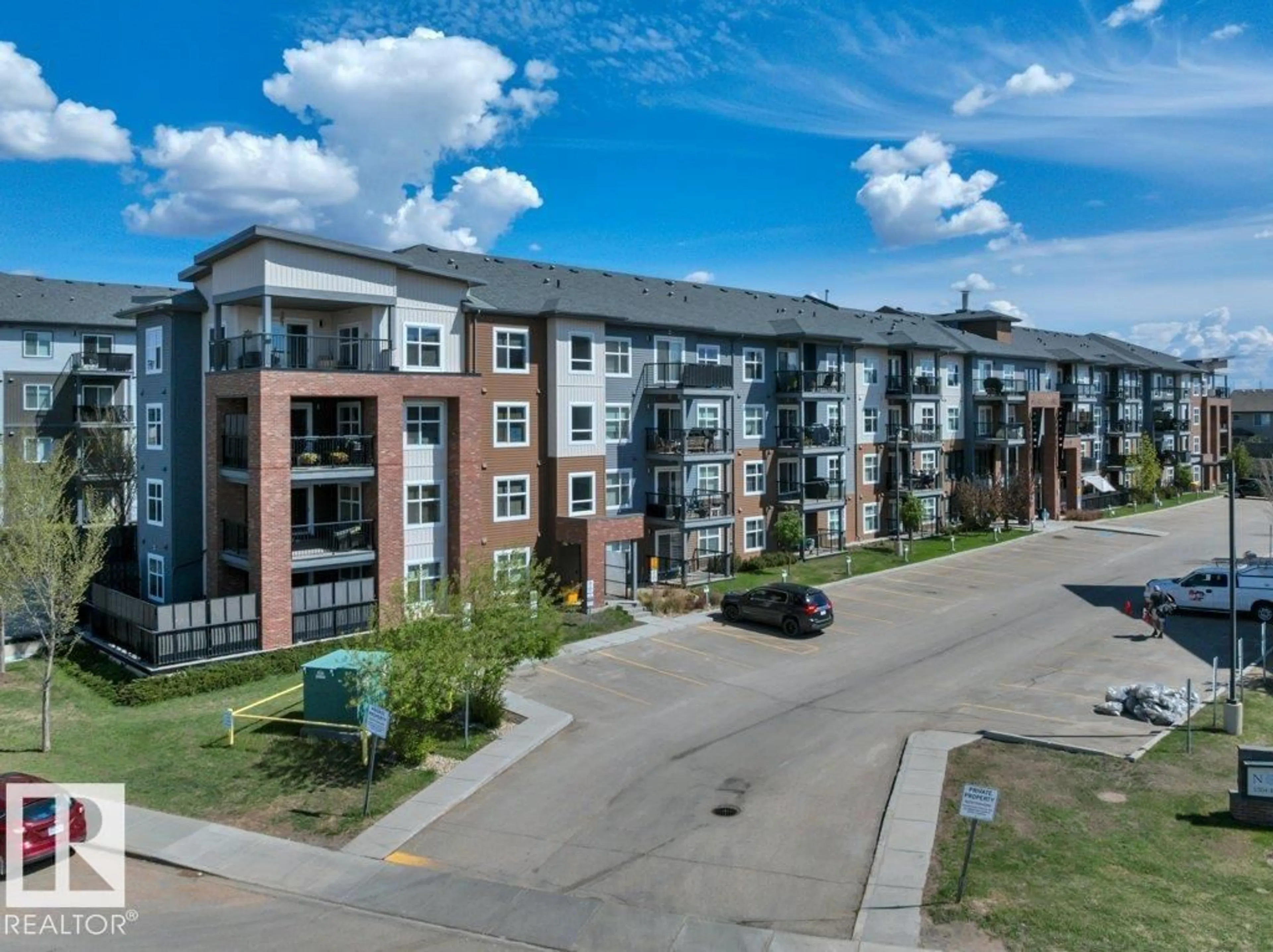 A pic from outside/outdoor area/front of a property/back of a property/a pic from drone, unknown for #206 - 5510 SCHONSEE DR, Edmonton Alberta T5Z0N9