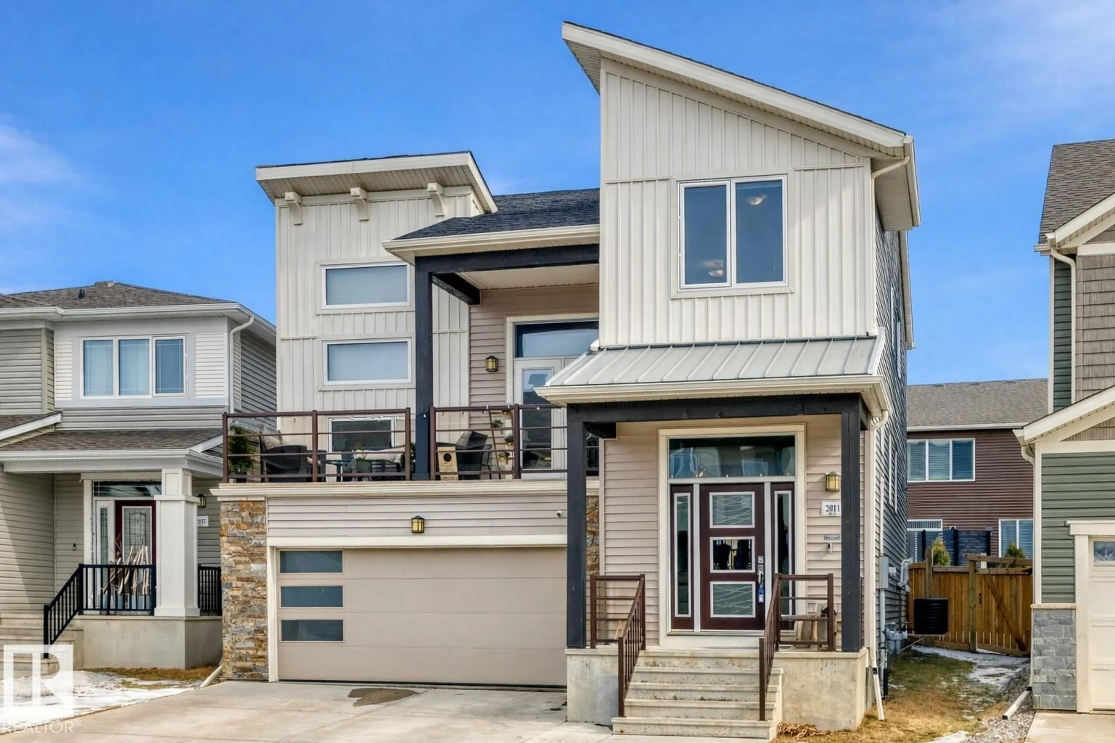 Home with vinyl exterior material, street for 2011 201 ST, Edmonton Alberta T6M0X7