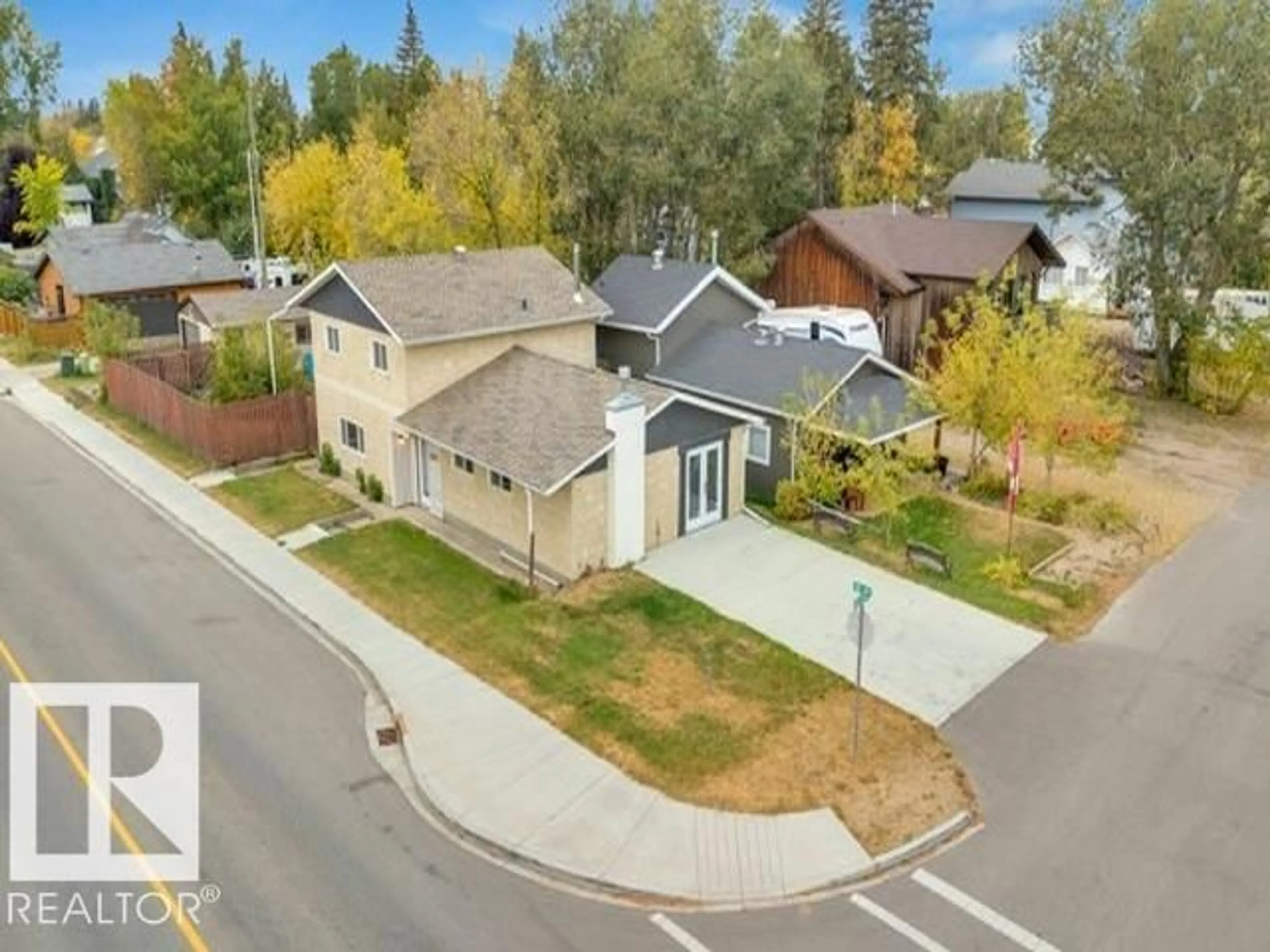 A pic from outside/outdoor area/front of a property/back of a property/a pic from drone, street for 3602 50TH AVE, Sylvan Lake Alberta T4S1B2