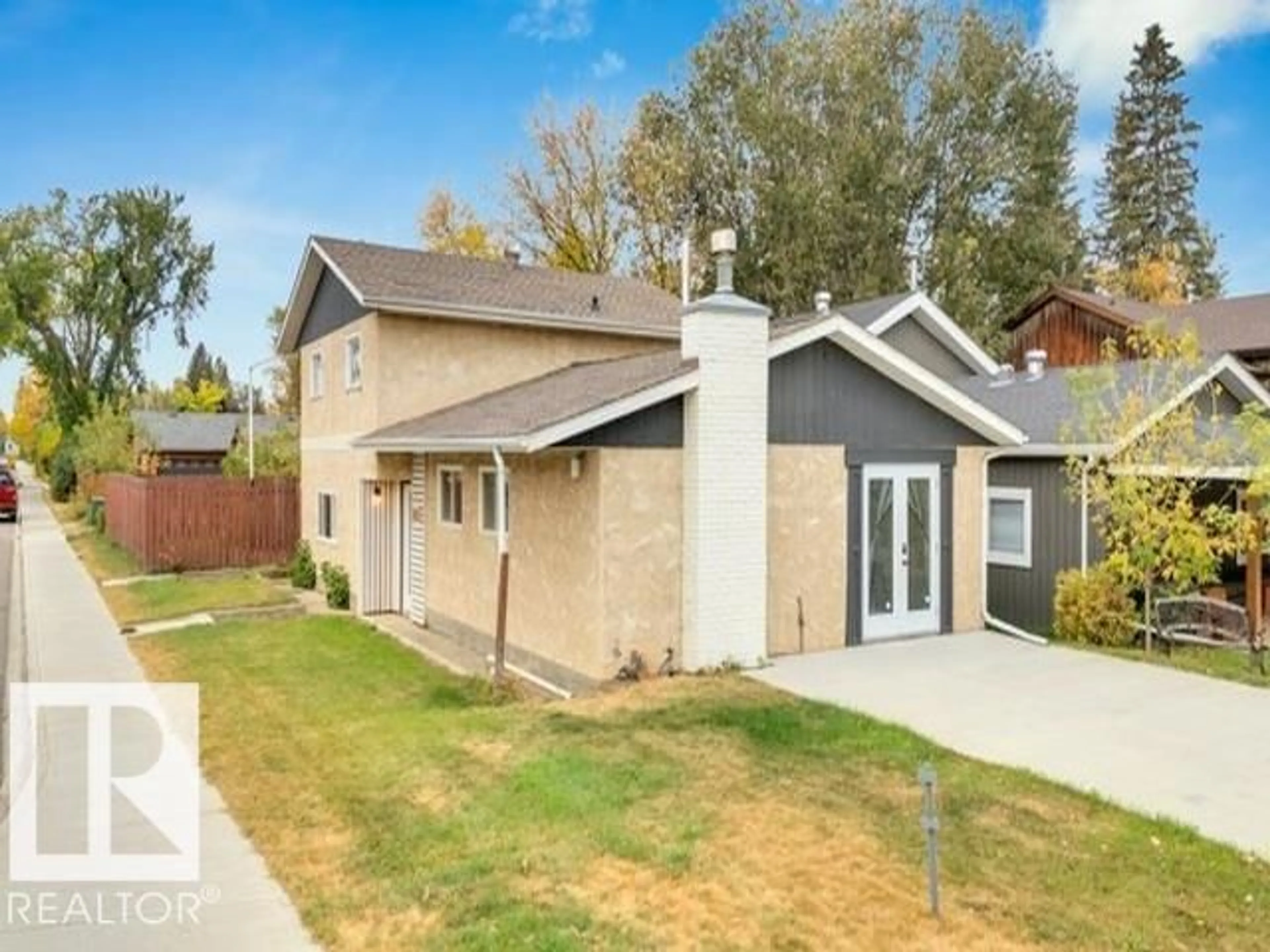 Home with vinyl exterior material, street for 3602 50TH AVE, Sylvan Lake Alberta T4S1B2