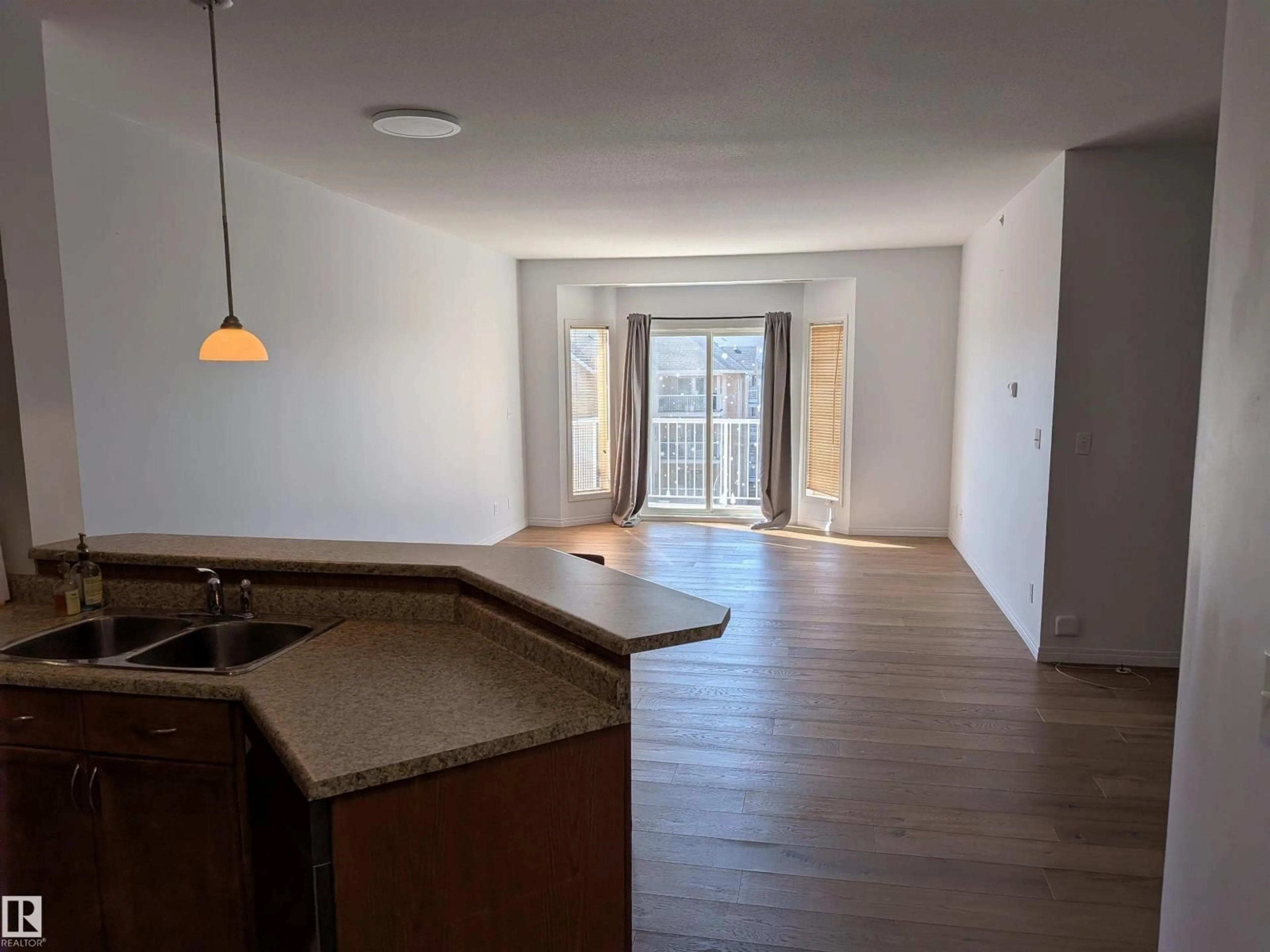 Open concept kitchen, unknown for #419 - 4304 139 AV, Edmonton Alberta T5Y0H6