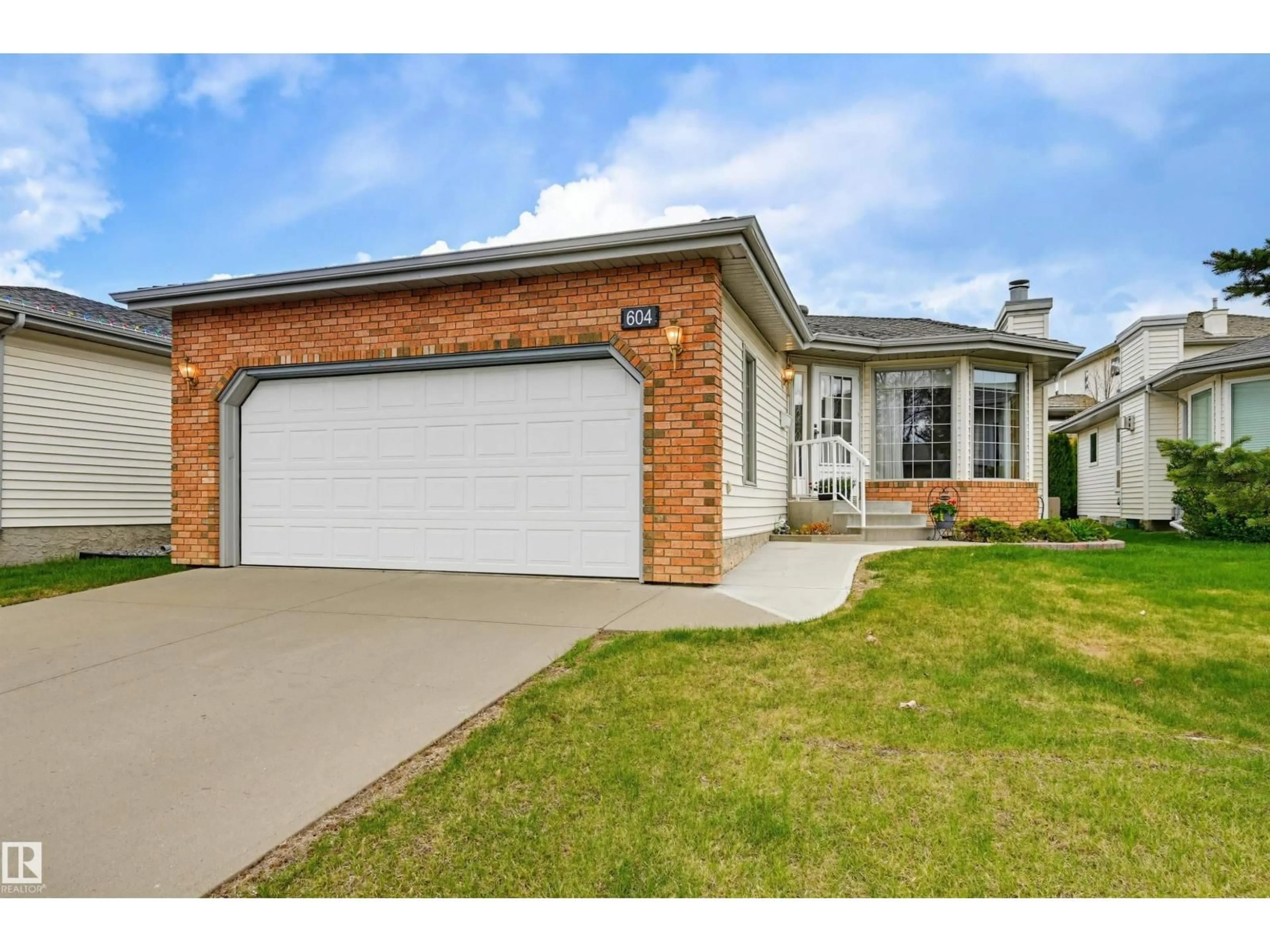 Home with brick exterior material, street for 604 REVELL WD, Edmonton Alberta T6R2H9