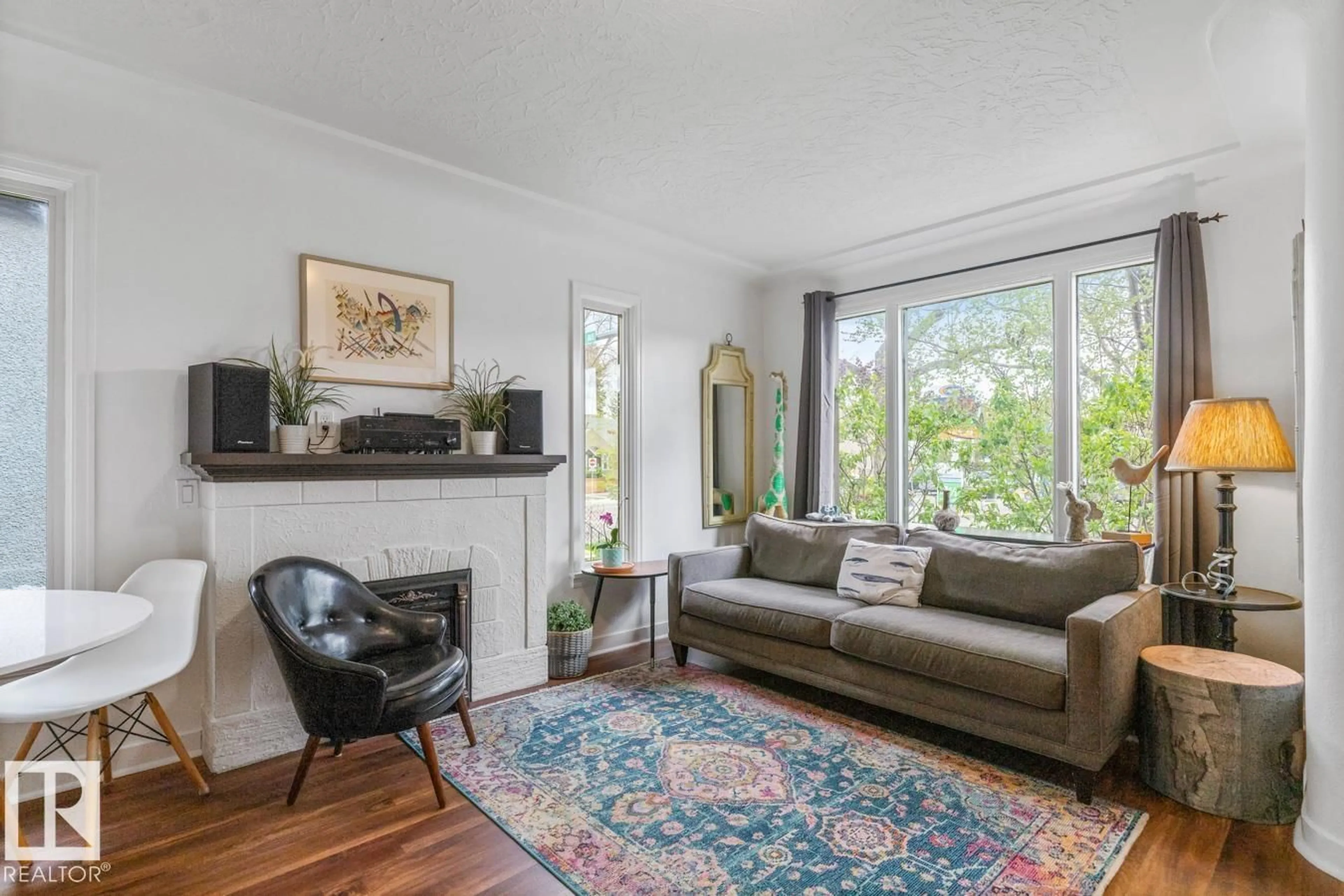 Living room with furniture, unknown for 9908 87 AV, Edmonton Alberta T6E2N7