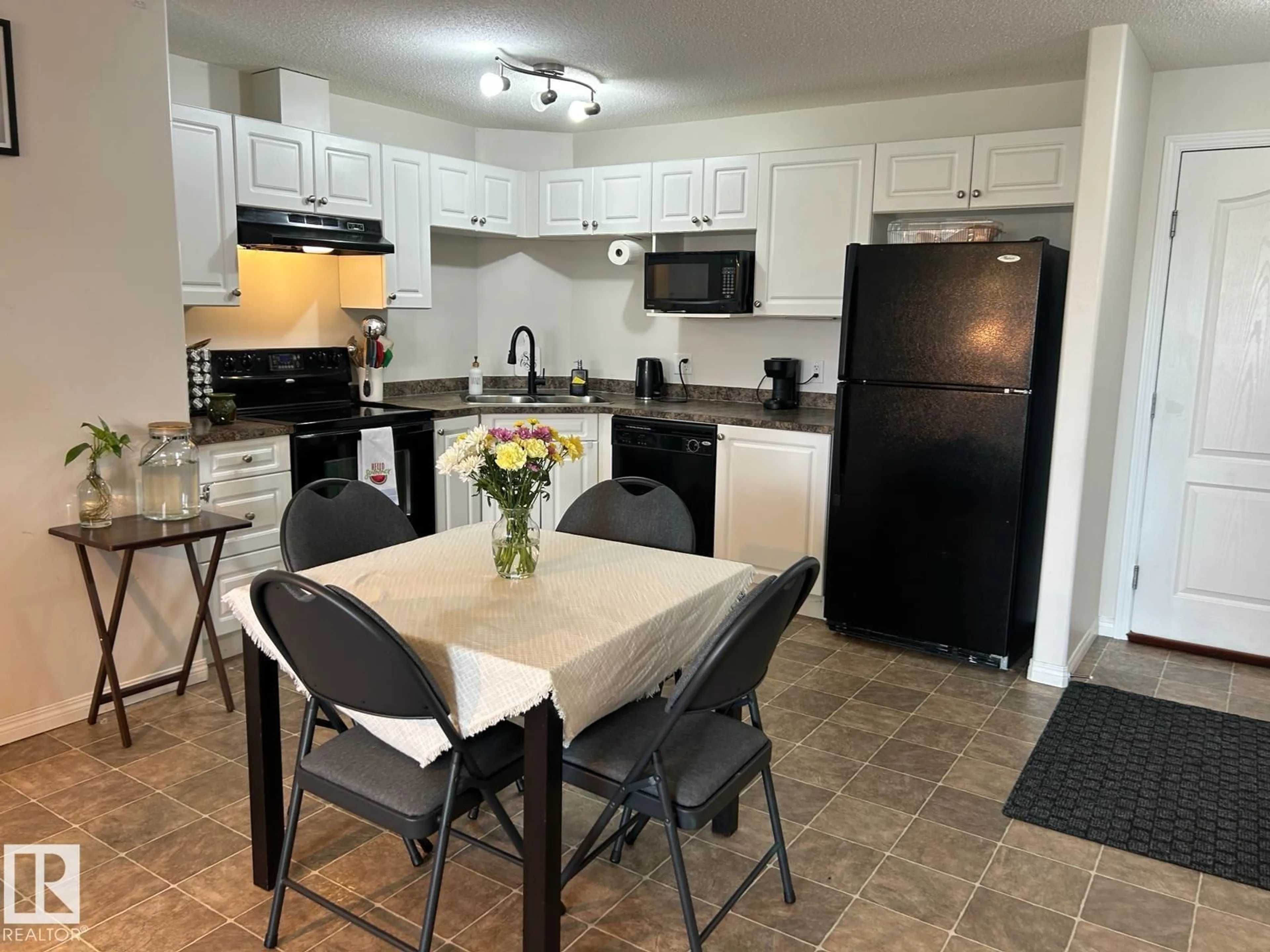 Open concept kitchen, ceramic/tile floor for 9363 - 1228 SIMPSON DR, Edmonton Alberta T6R0N2