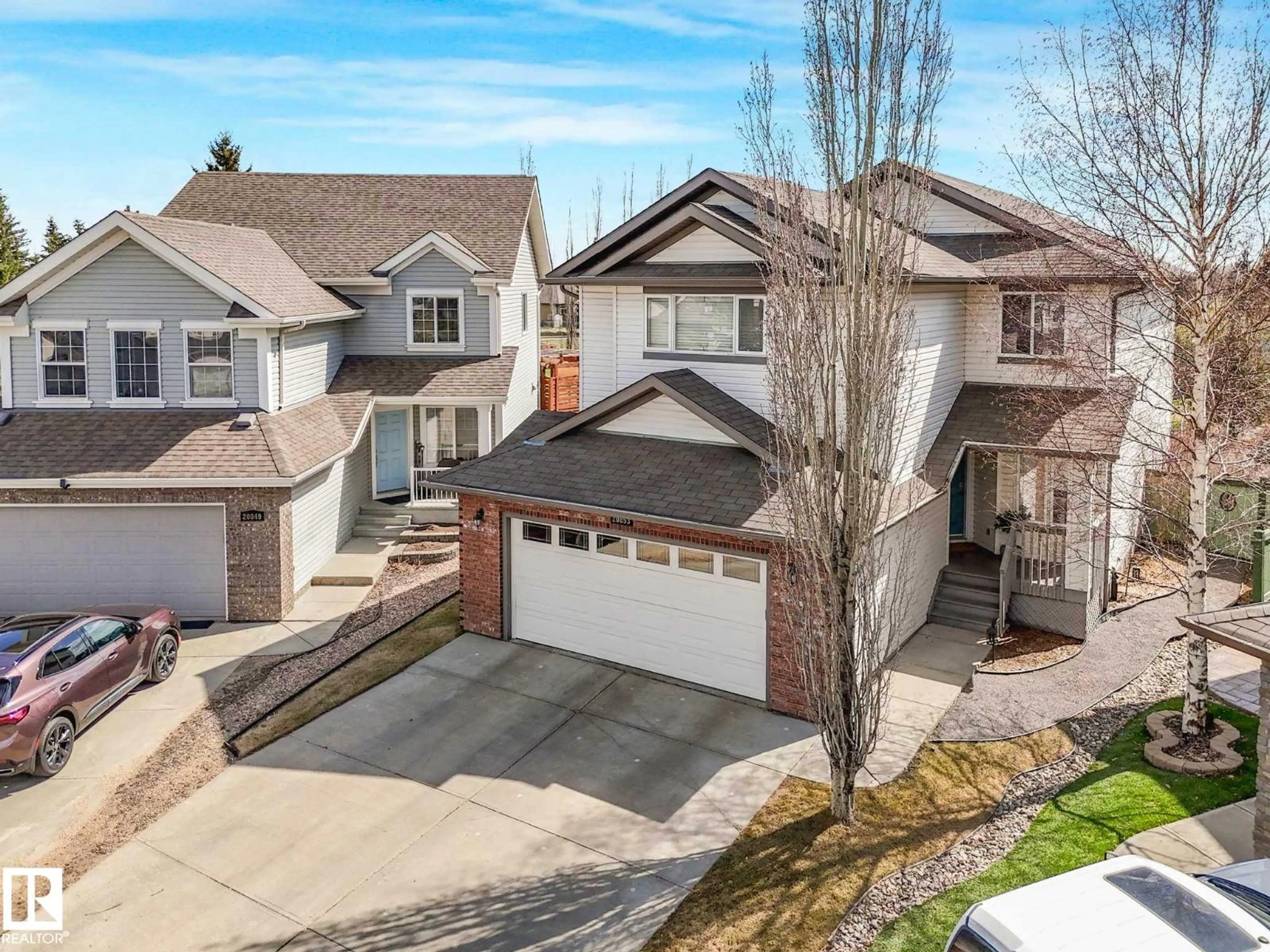 A pic from outside/outdoor area/front of a property/back of a property/a pic from drone, street for 20853 92A AV NW, Edmonton Alberta T5T3Z1