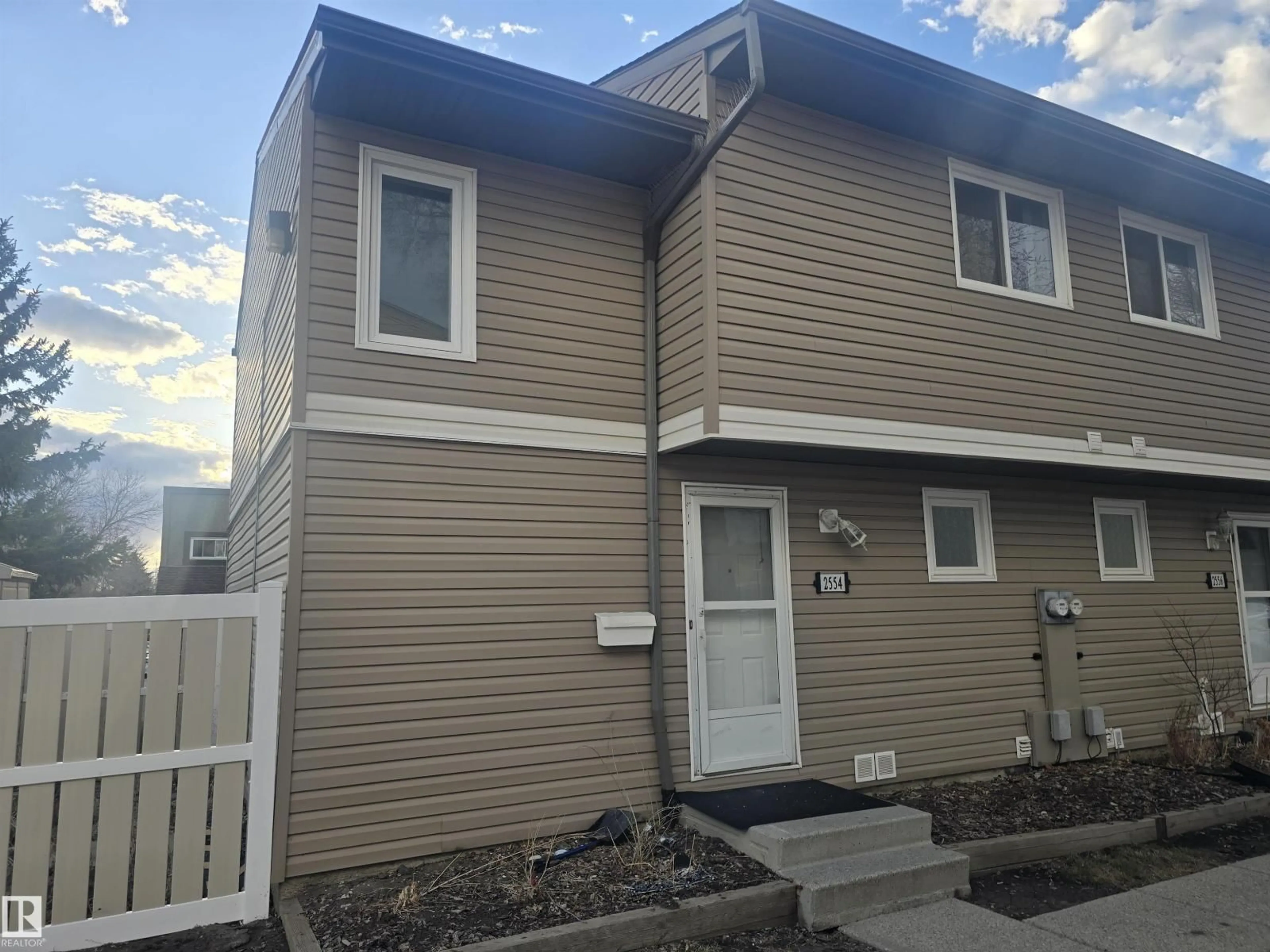Home with vinyl exterior material, street for 2554 79 ST, Edmonton Alberta T6K3Y4