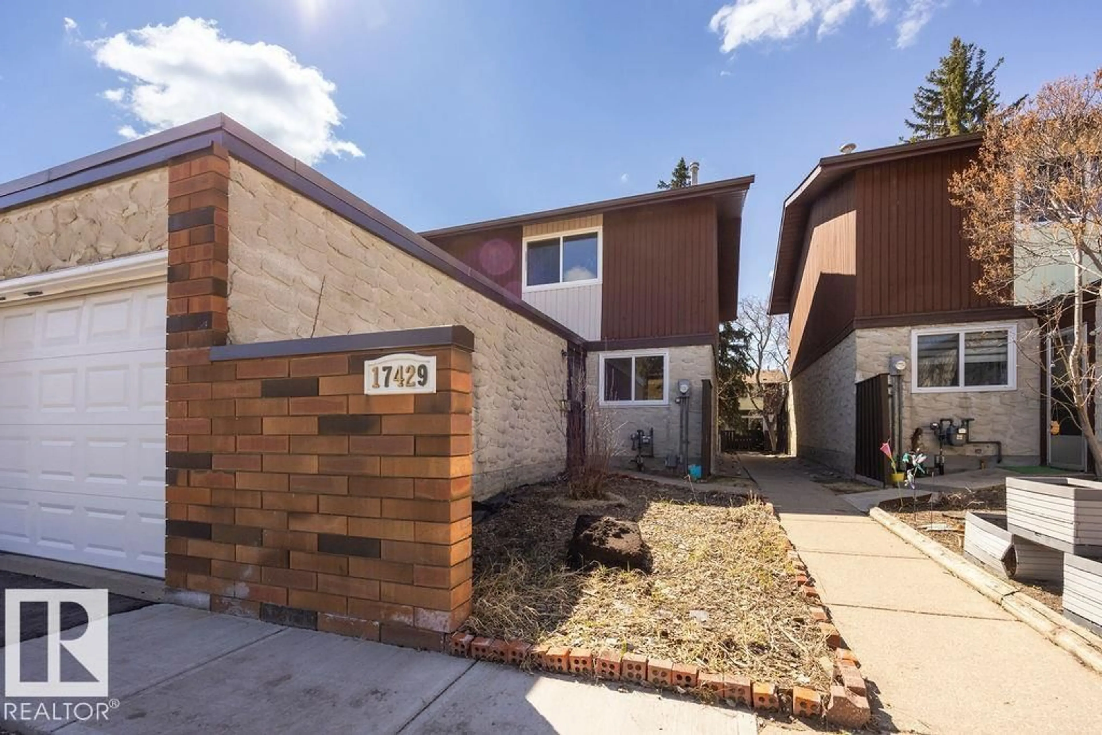 Home with brick exterior material, street for 17429 77 AV, Edmonton Alberta T5T0H9