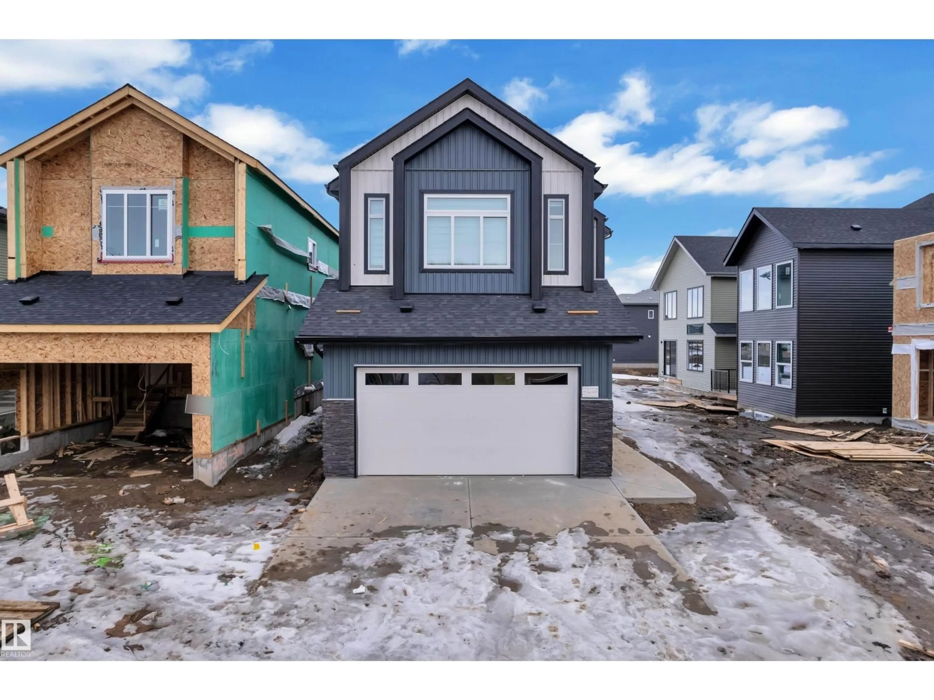 Home with vinyl exterior material, street for SW - 8458 MAYDAY LI, Edmonton Alberta T6X3E6