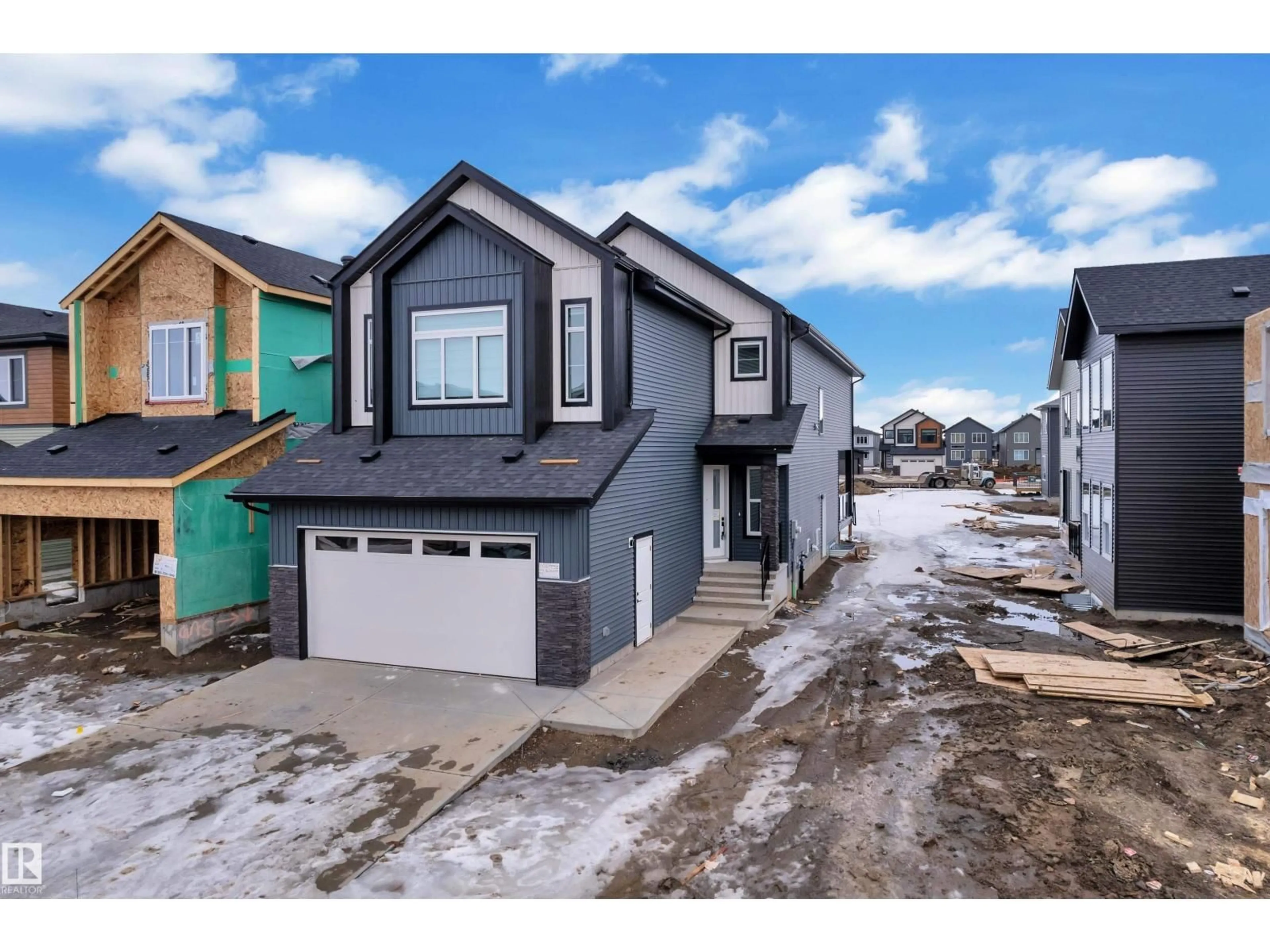 Home with vinyl exterior material, street for SW - 8458 MAYDAY LI, Edmonton Alberta T6X3E6