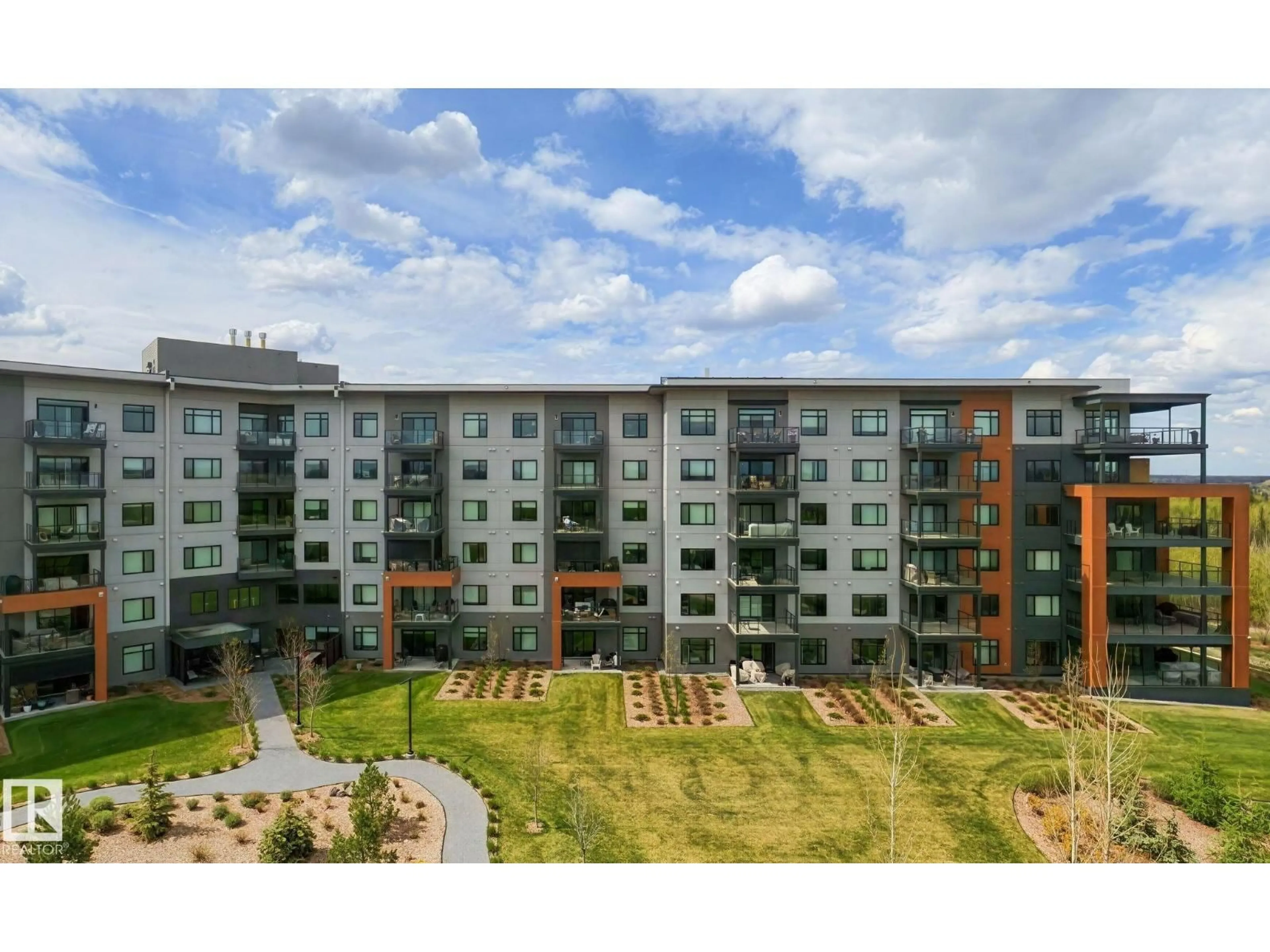 A pic from outside/outdoor area/front of a property/back of a property/a pic from drone, building for 207 - 7463 MAY CM, Edmonton Alberta T6R0X1