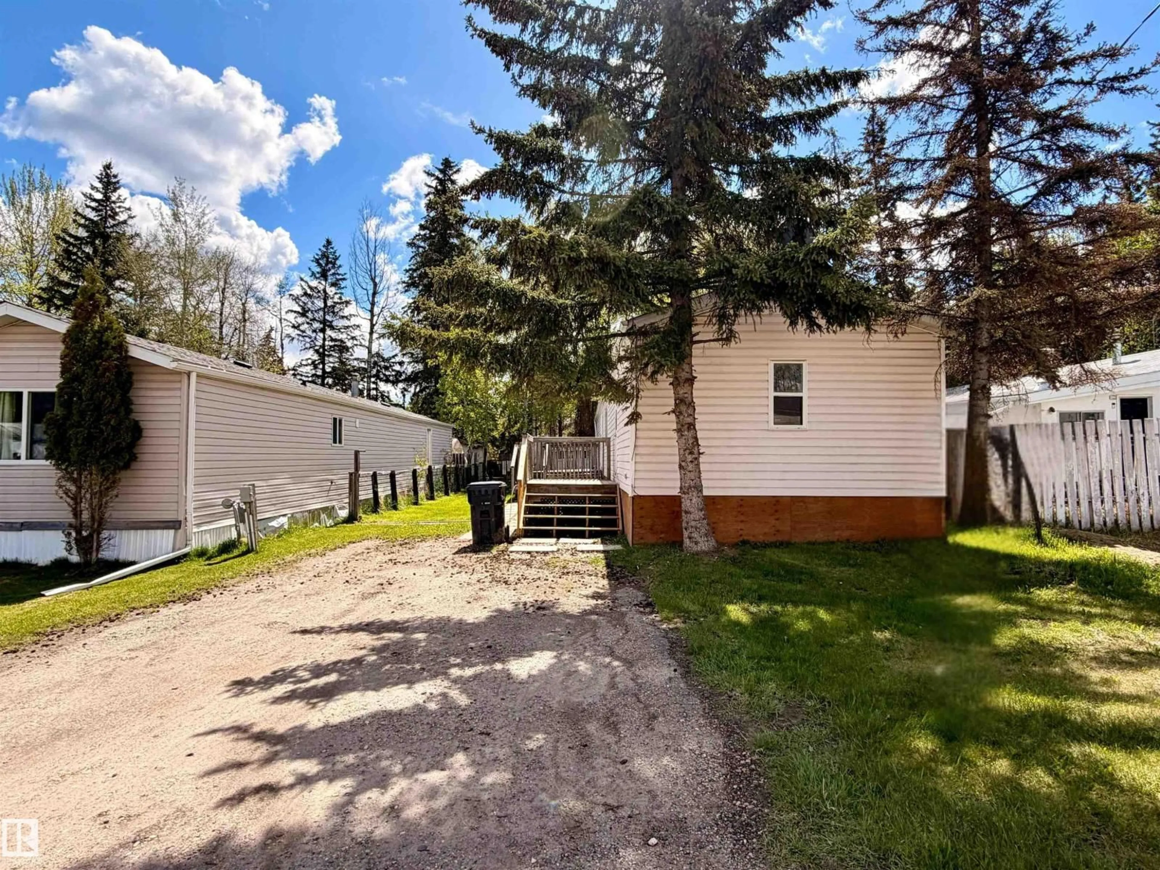 A pic from outside/outdoor area/front of a property/back of a property/a pic from drone, street for 74 - 5644 50 ST, Drayton Valley Alberta T7A1L4