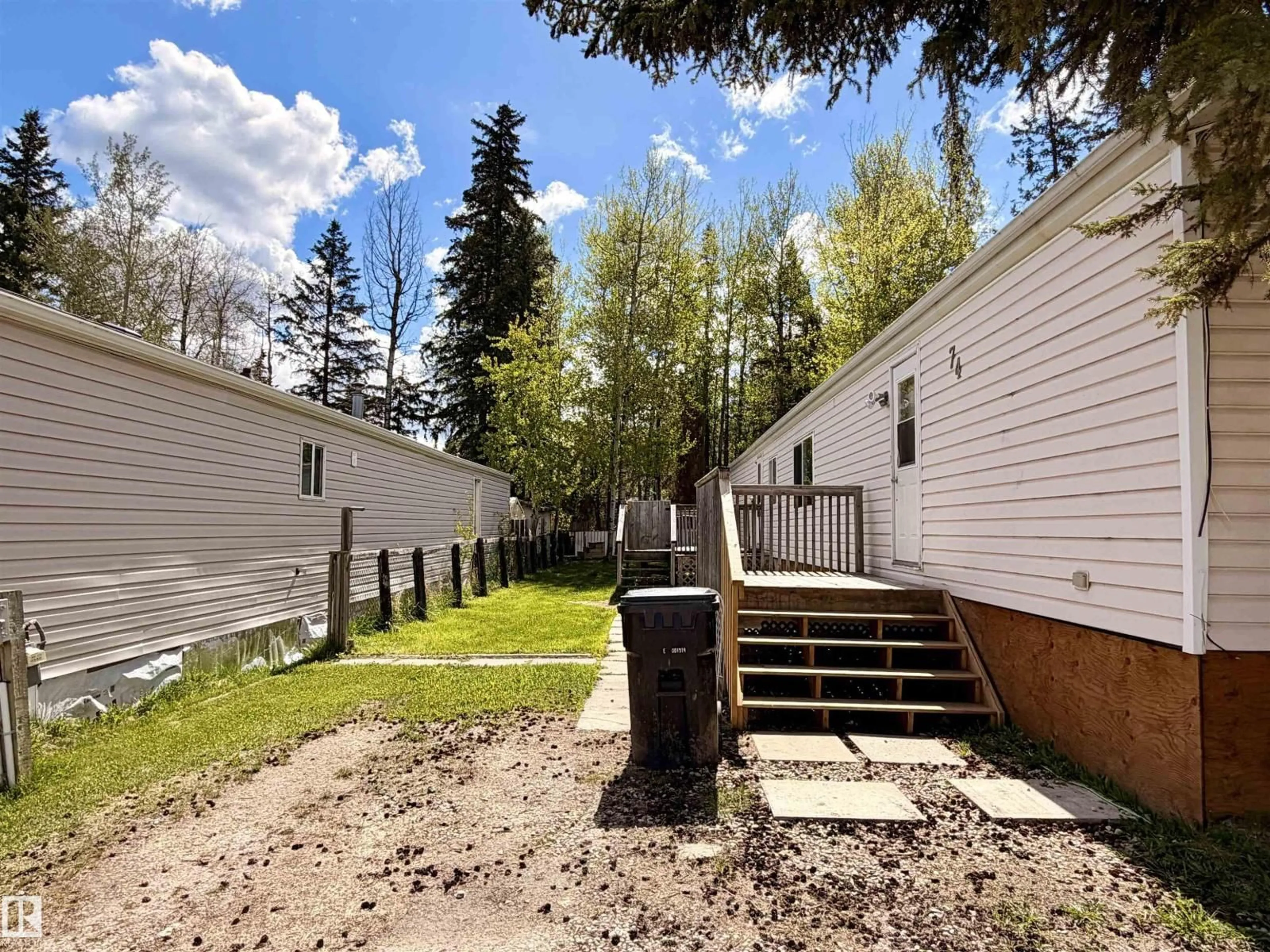 A pic from outside/outdoor area/front of a property/back of a property/a pic from drone, street for 74 - 5644 50 ST, Drayton Valley Alberta T7A1L4