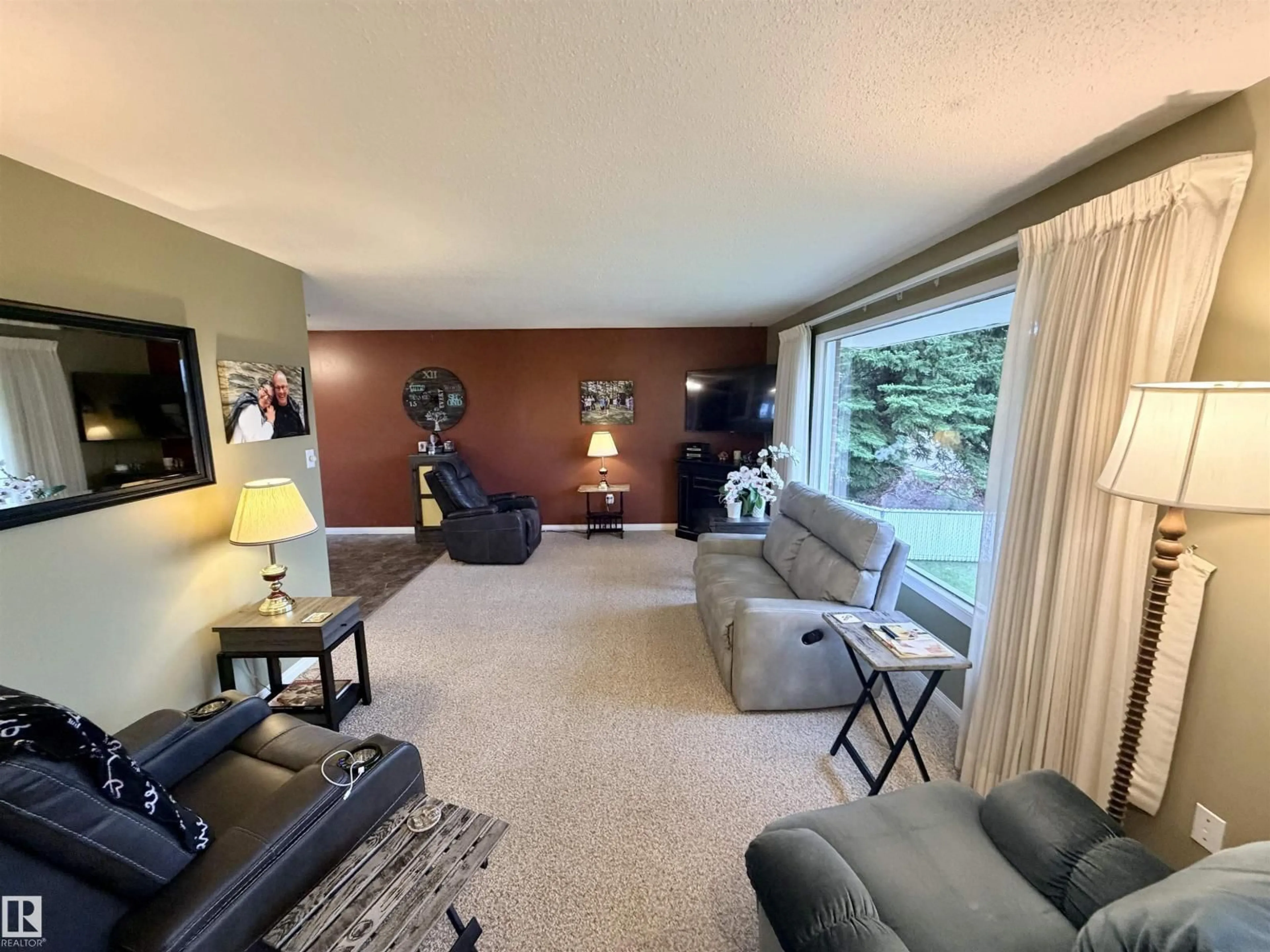 Living room with furniture, unknown for 5622 52 AV, St. Paul Town Alberta T0A3A1