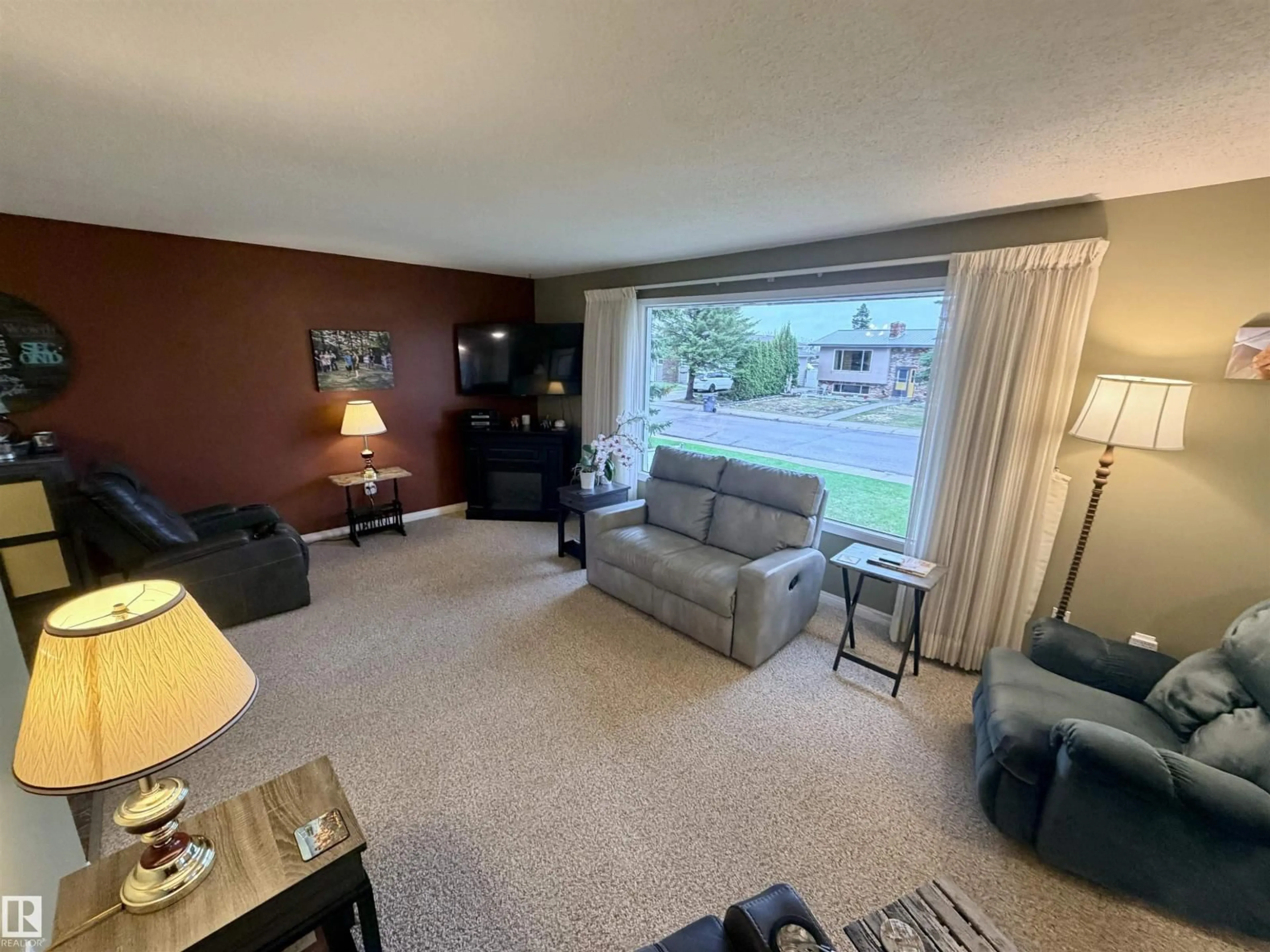Living room with furniture, unknown for 5622 52 AV, St. Paul Town Alberta T0A3A1