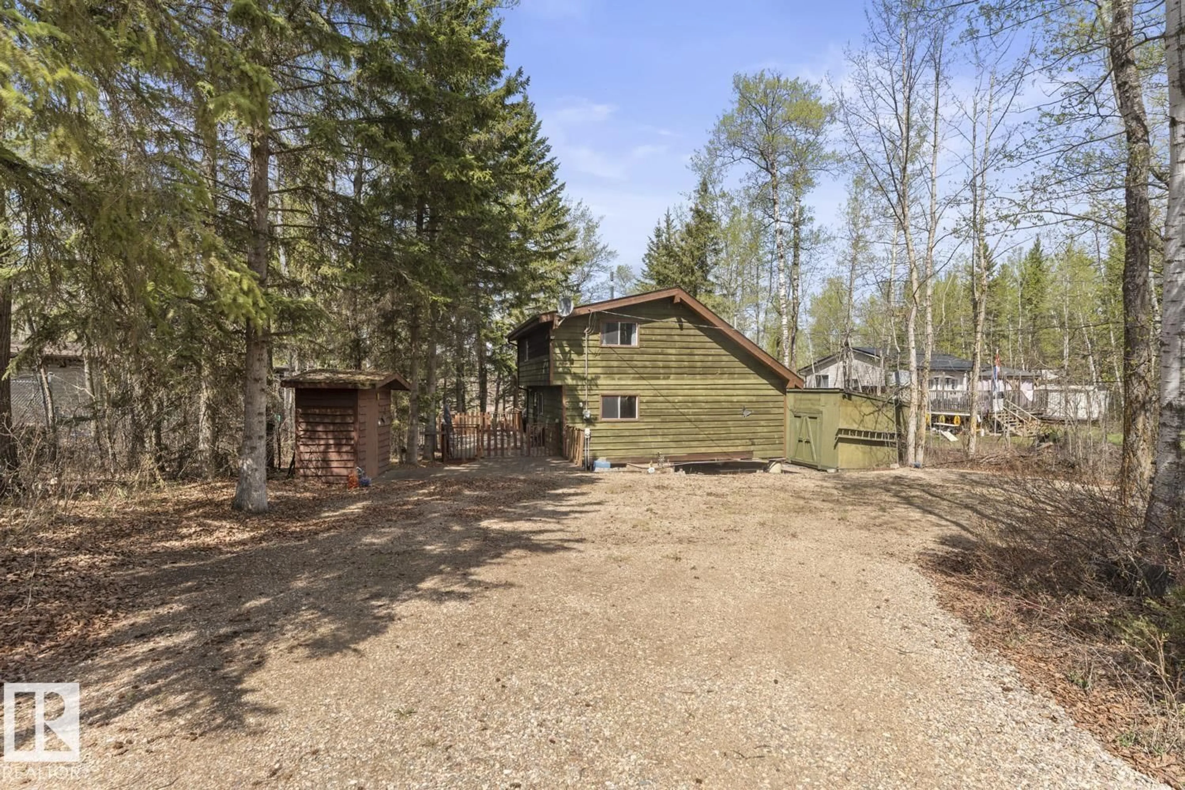 A pic from outside/outdoor area/front of a property/back of a property/a pic from drone, forest/trees view for 402 - 11121 TWP ROAD 595, Rural St. Paul County Alberta T0A0C0