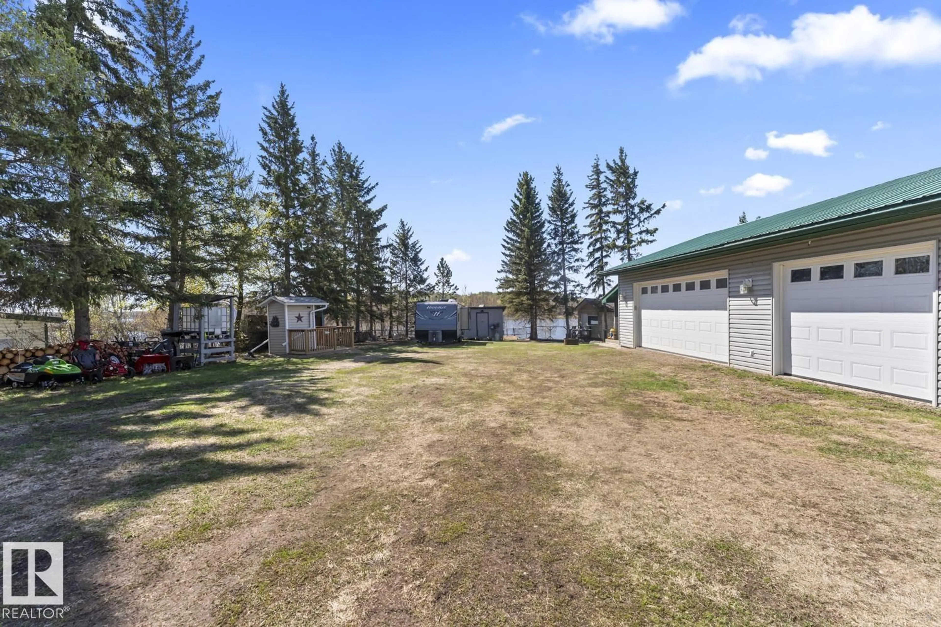 A pic from outside/outdoor area/front of a property/back of a property/a pic from drone, mountain view for 705 - 11025 HGHWAY 28, Rural St. Paul County Alberta T0A0C0