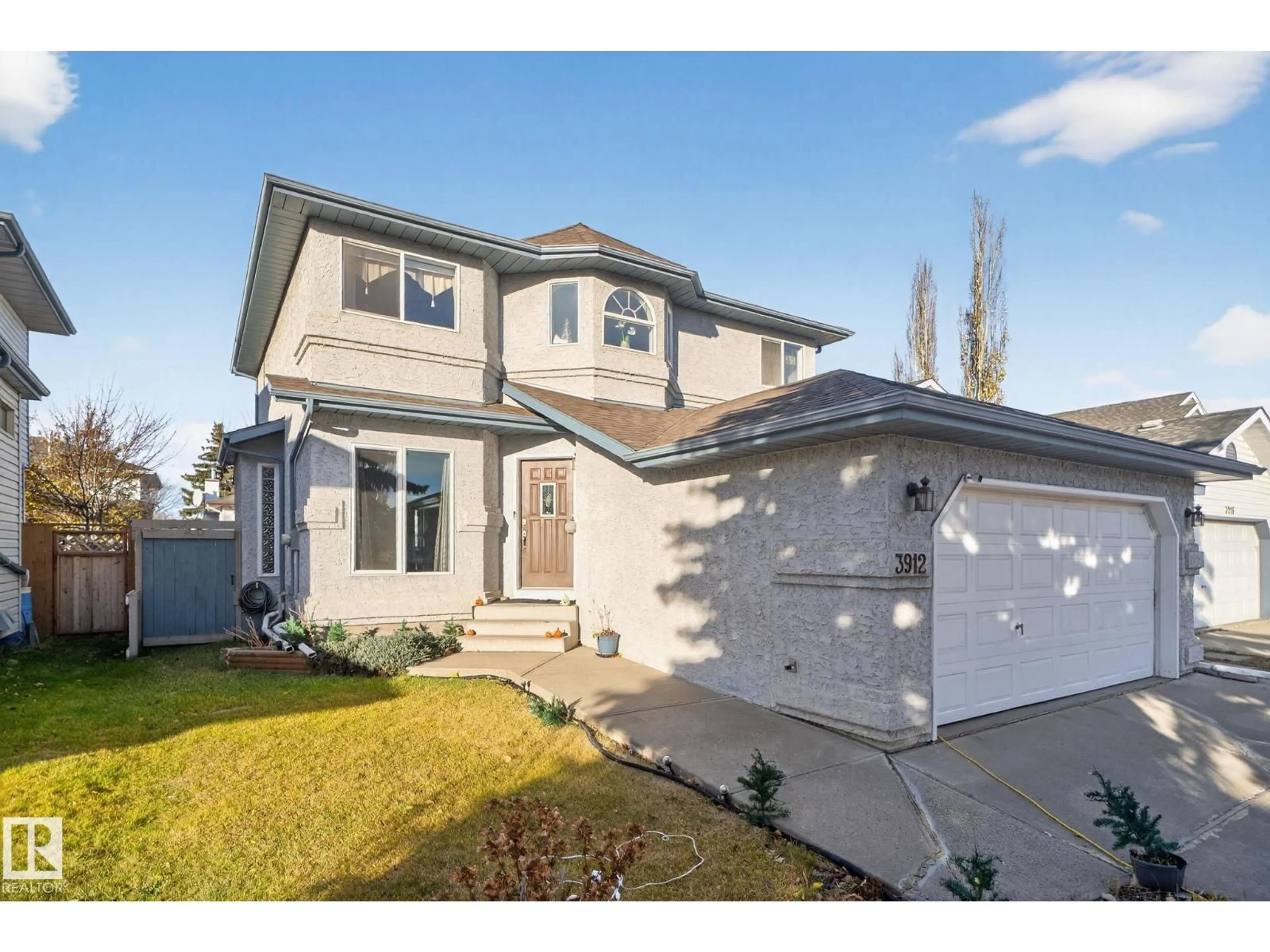 Home with vinyl exterior material, street for 3912 31 ST, Edmonton Alberta T6T1J5