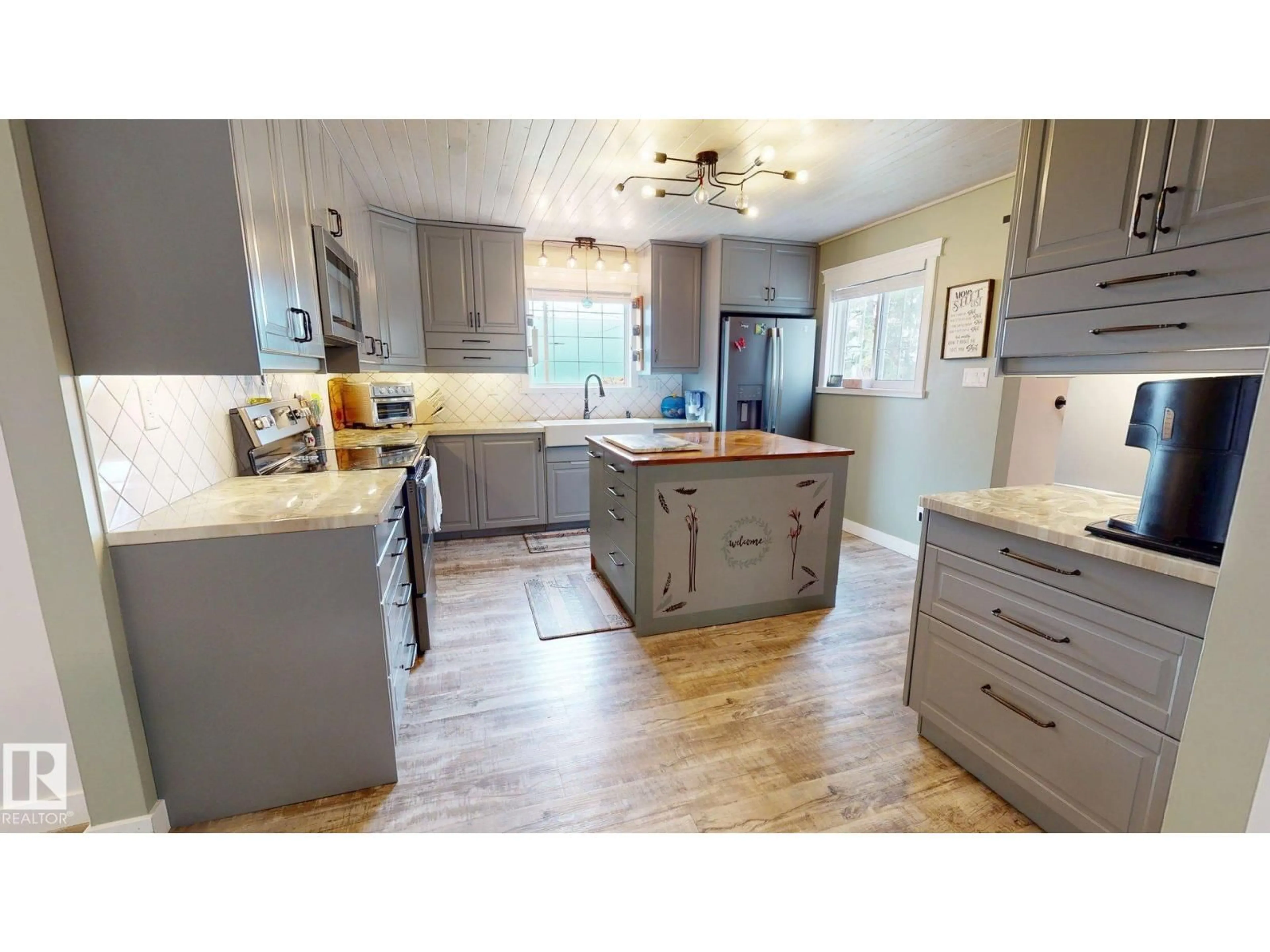 Open concept kitchen, wood/laminate floor for 55268 RANGE ROAD 212, Rural Strathcona County Alberta T8L4A9