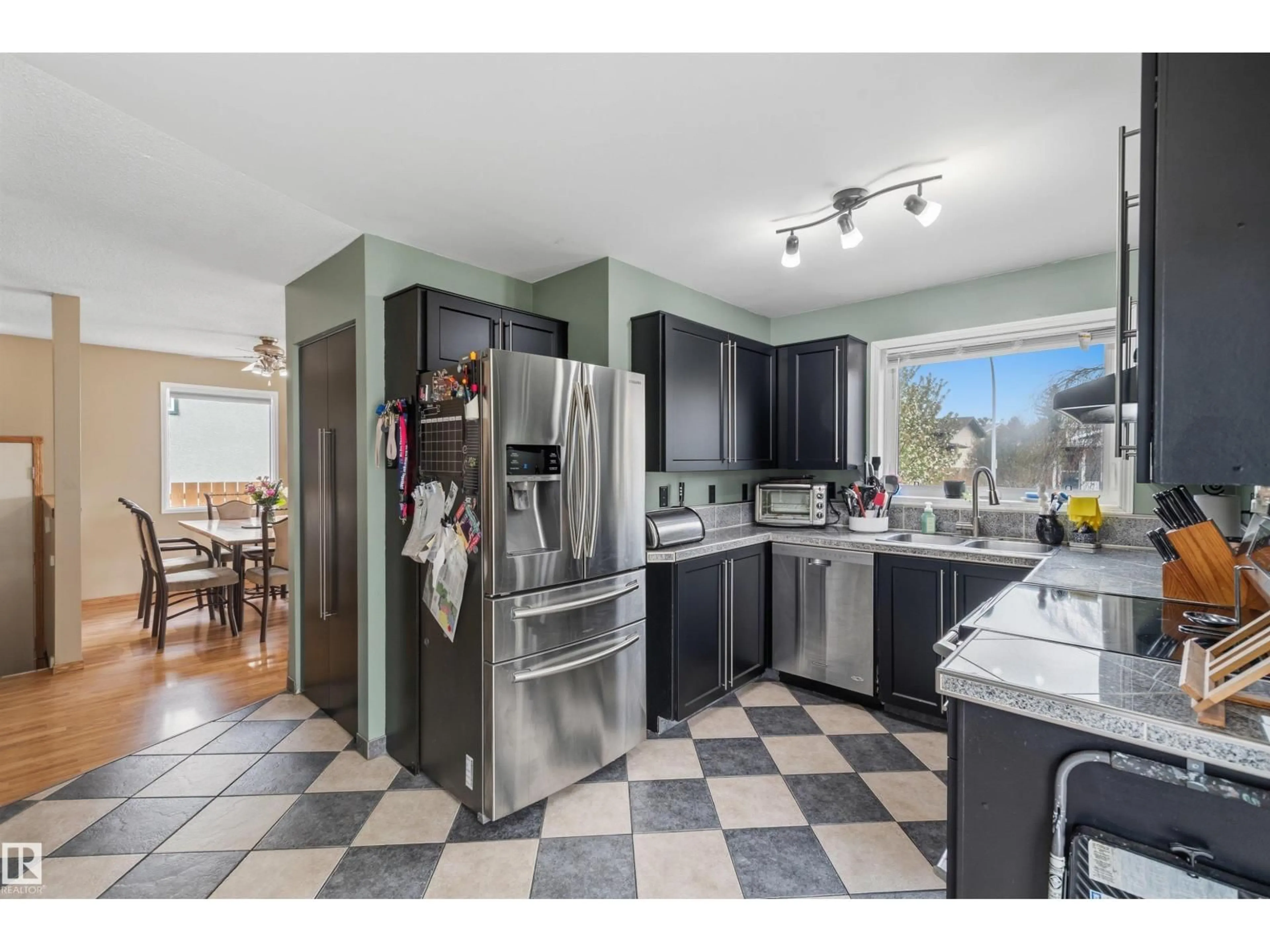 Open concept kitchen, ceramic/tile floor for 18648 57 AV, Edmonton Alberta T6M2A5