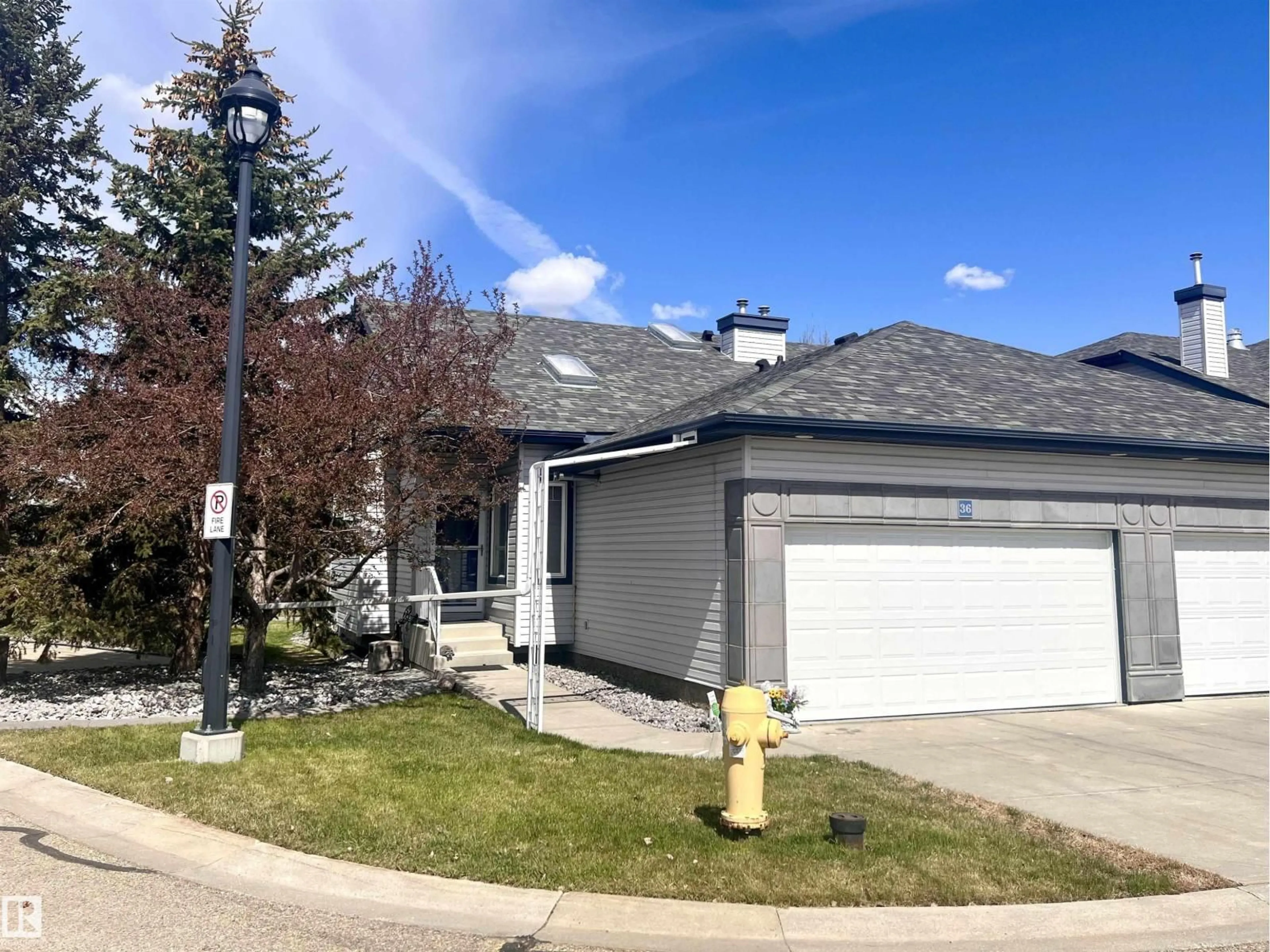 A pic from outside/outdoor area/front of a property/back of a property/a pic from drone, street for 36 - 3003 34 AV, Edmonton Alberta T6T0A1