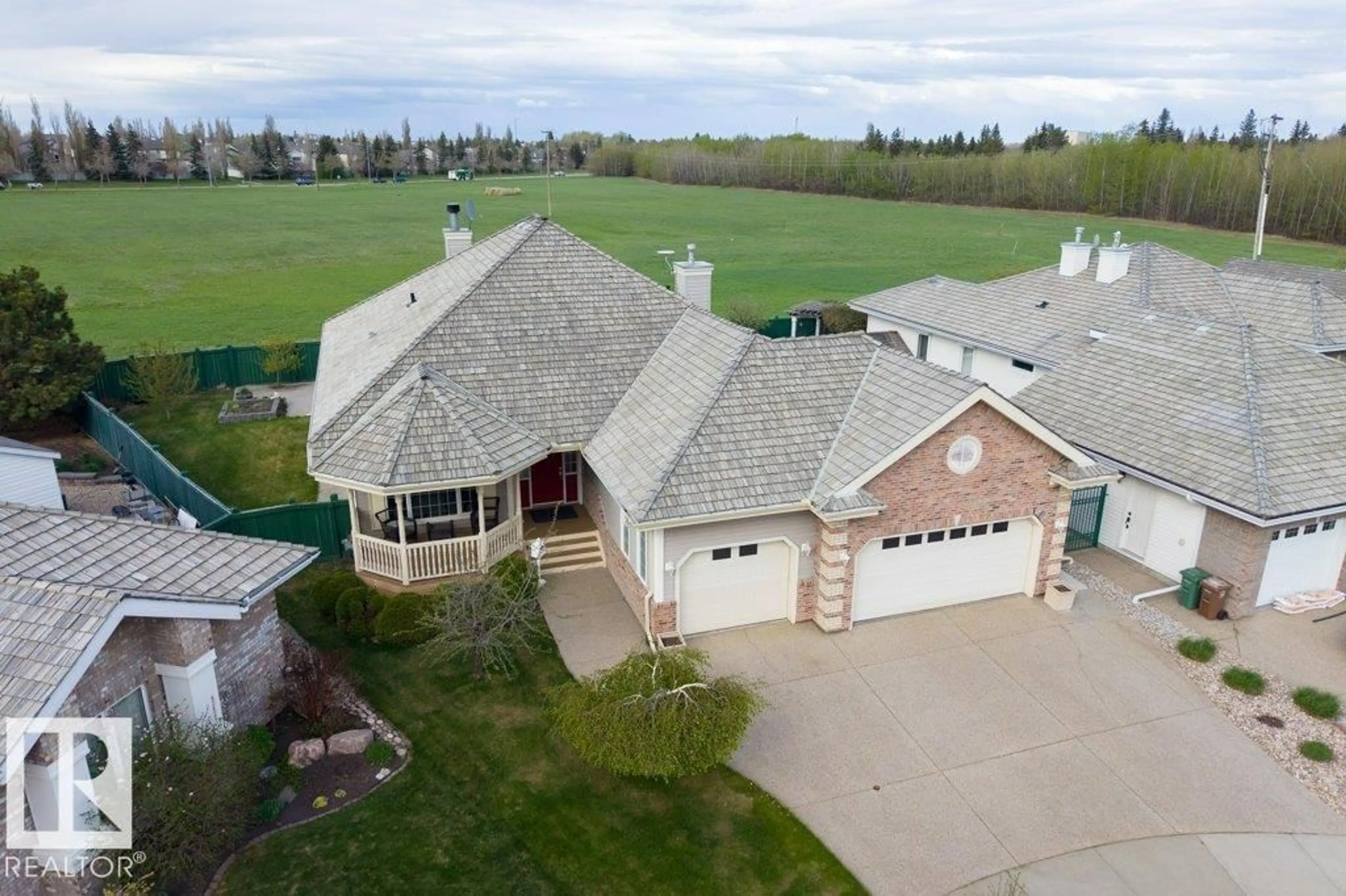 A pic from outside/outdoor area/front of a property/back of a property/a pic from drone, unknown for 4 PLACER CL, St. Albert Alberta T8N6A2