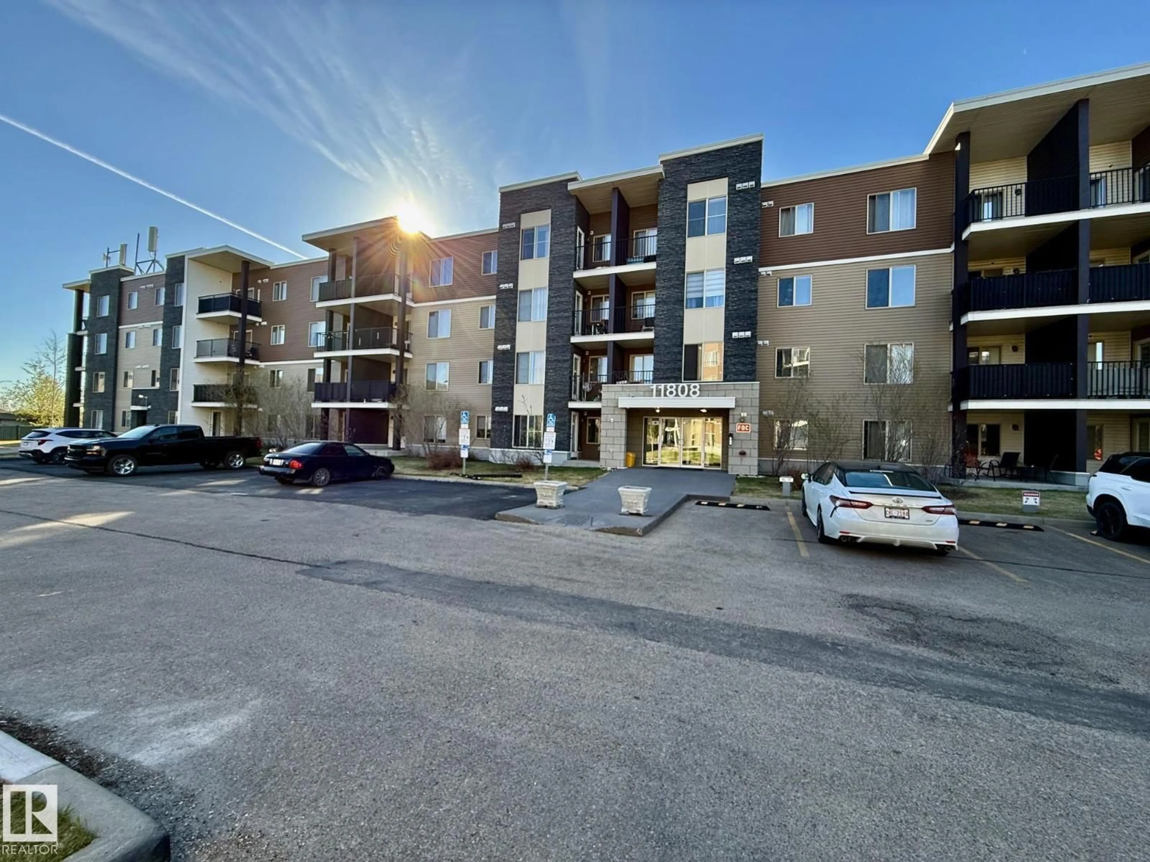 A pic from outside/outdoor area/front of a property/back of a property/a pic from drone, building for #116 - 11808 22 AV, Edmonton Alberta T6W2A2