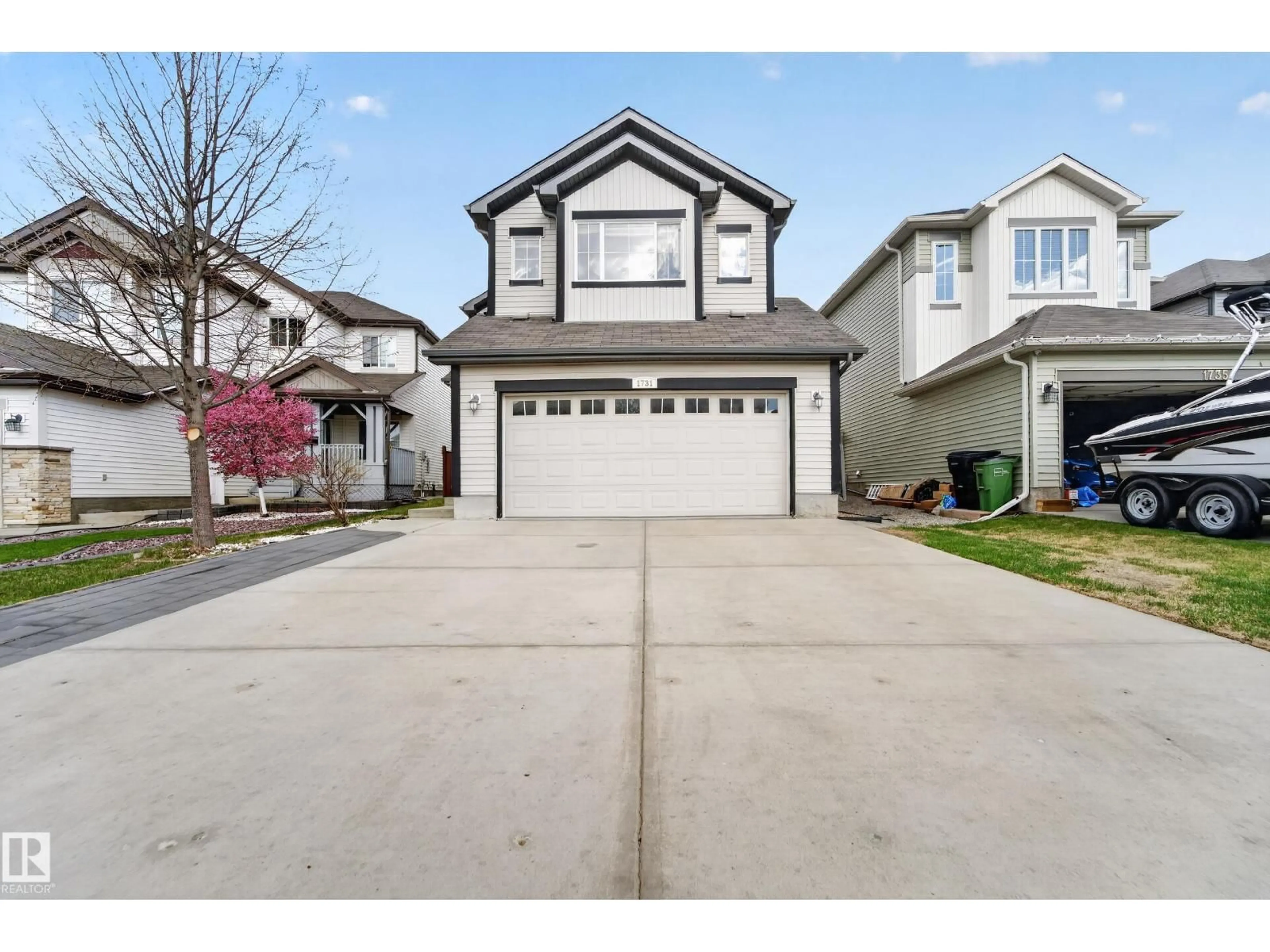Home with vinyl exterior material, street for 1731 55 ST, Edmonton Alberta T6X1R2