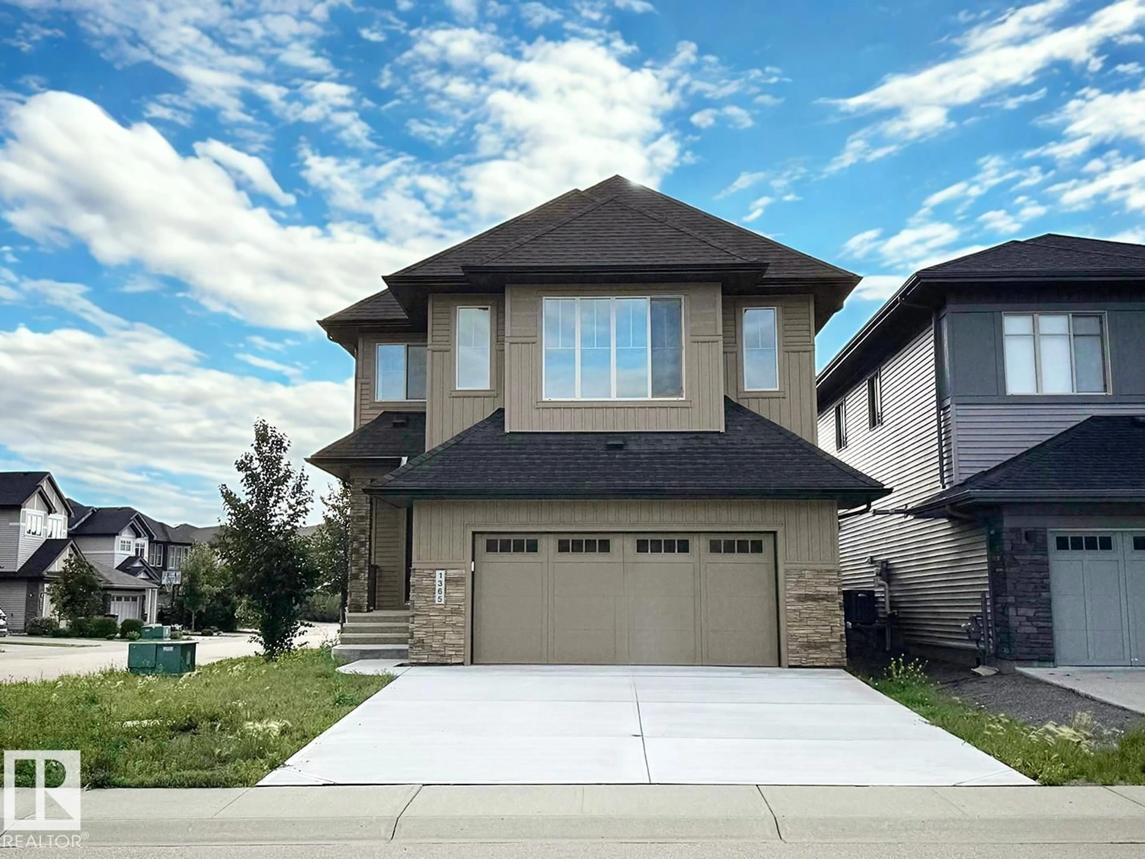 Home with vinyl exterior material, street for SW - 1365 AINSLIE WD, Edmonton Alberta T6W3E9