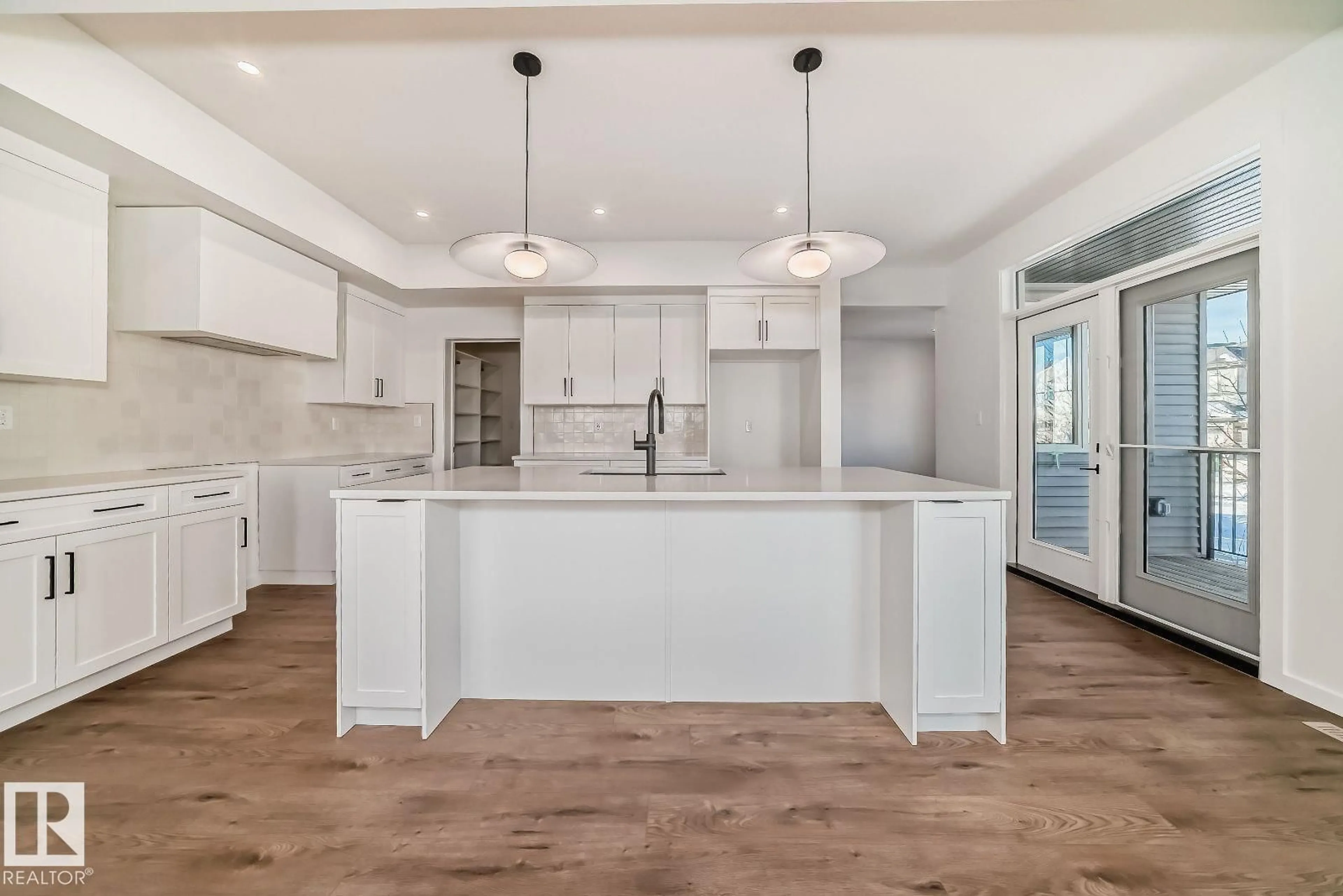 Open concept kitchen, unknown for SW - 1365 AINSLIE WD, Edmonton Alberta T6W3E9