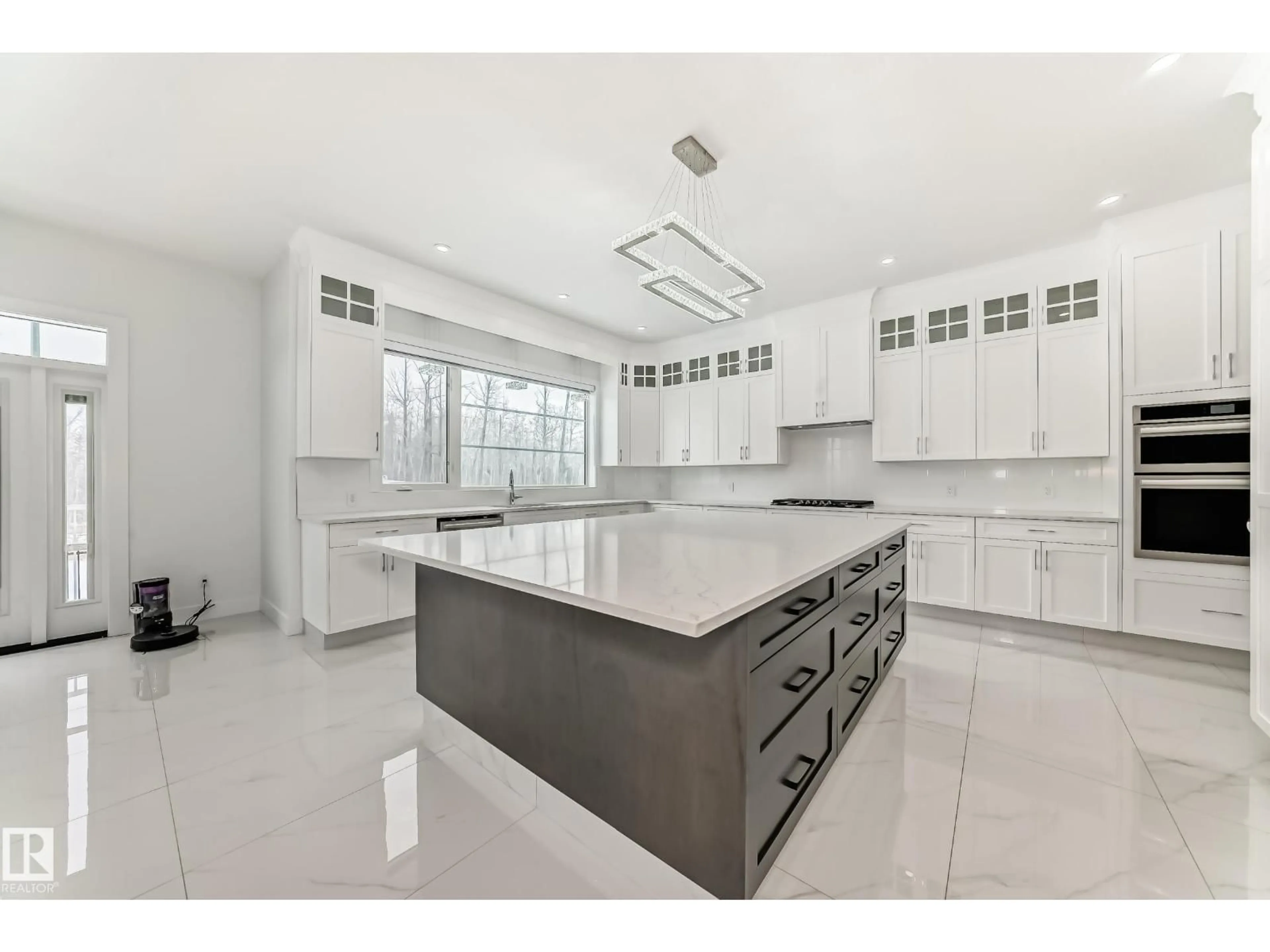 Open concept kitchen, ceramic/tile floor for 340 33 AVE NW, Edmonton Alberta T6T2S9