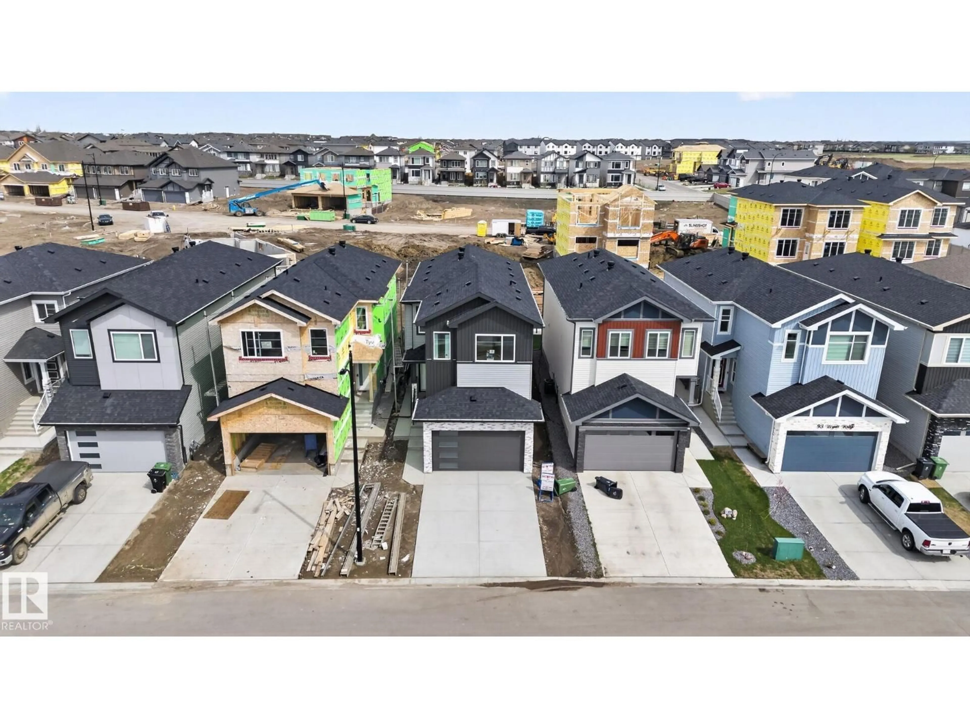 A pic from outside/outdoor area/front of a property/back of a property/a pic from drone, street for 101 WYATT RG, Fort Saskatchewan Alberta T8L3L7