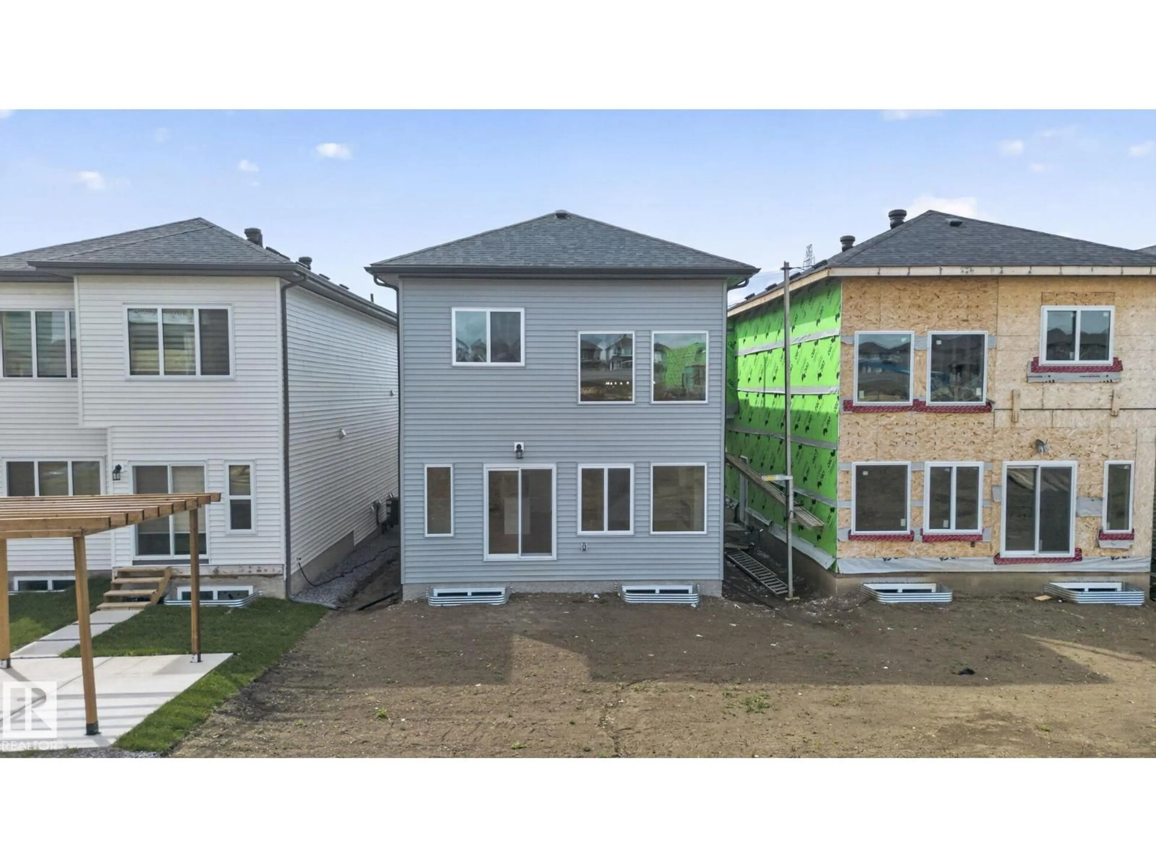 A pic from outside/outdoor area/front of a property/back of a property/a pic from drone, street for 101 WYATT RG, Fort Saskatchewan Alberta T8L3L7