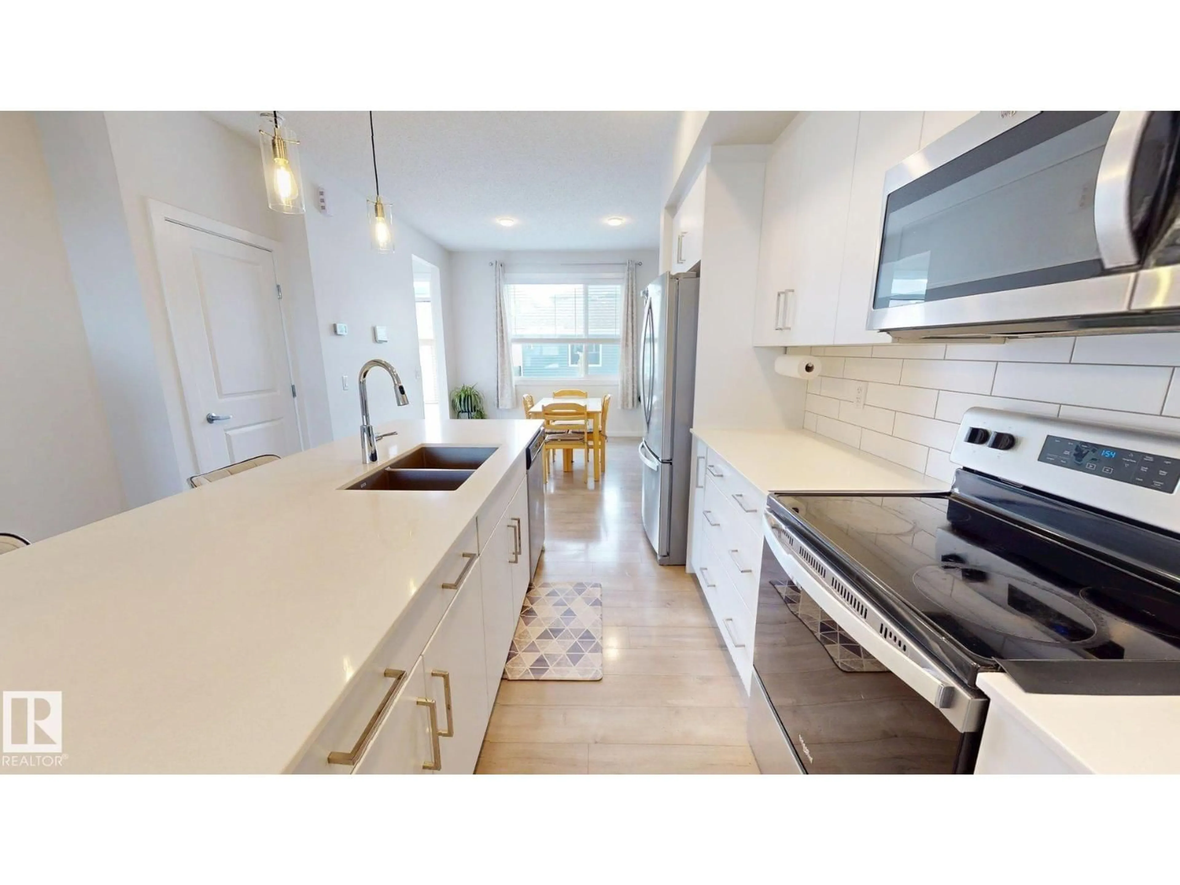 Open concept kitchen, unknown for 2093 MAPLE RD, Edmonton Alberta T6T2S8