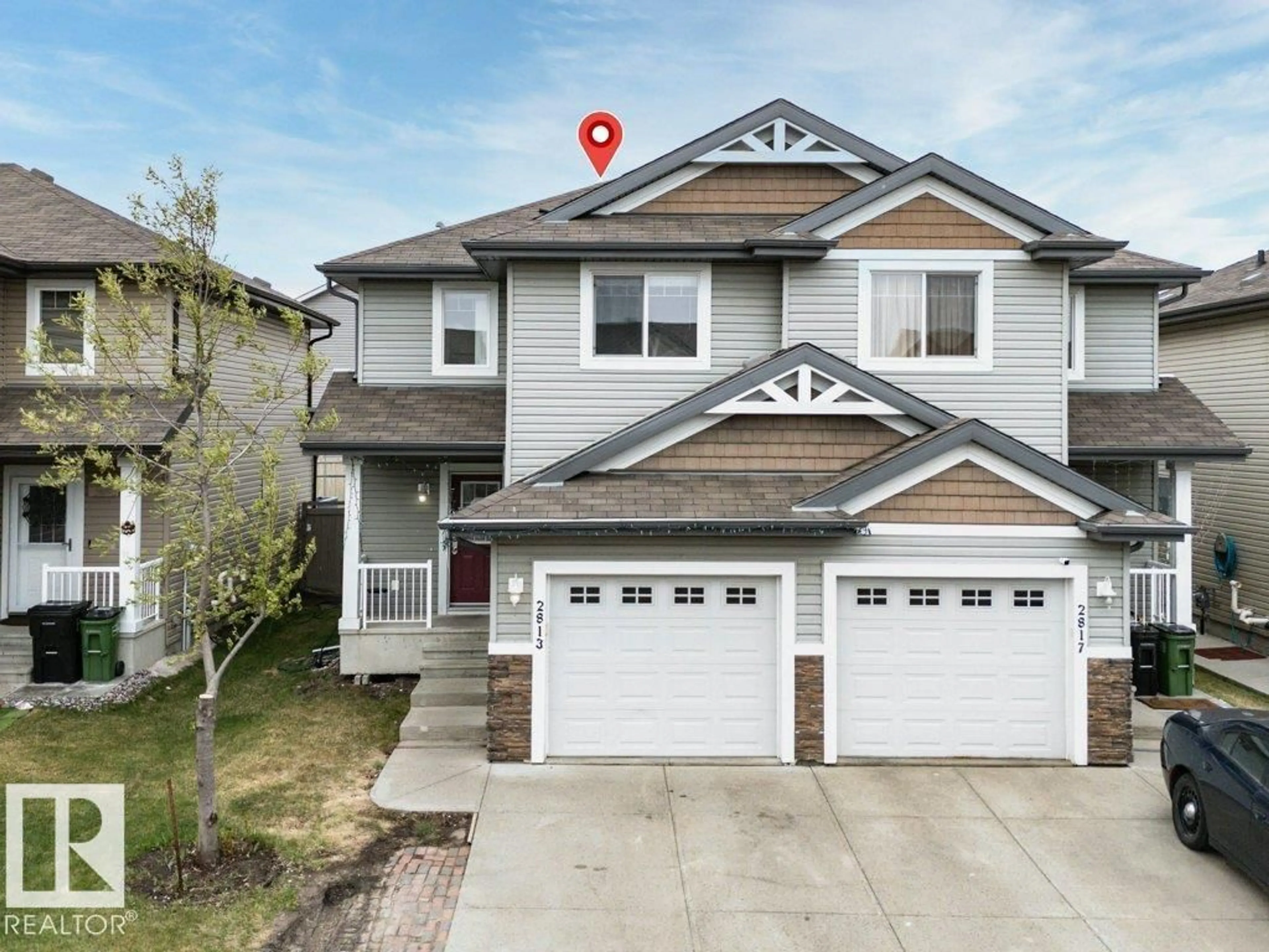 Home with vinyl exterior material, street for 2813 18A AV, Edmonton Alberta T6T0N8