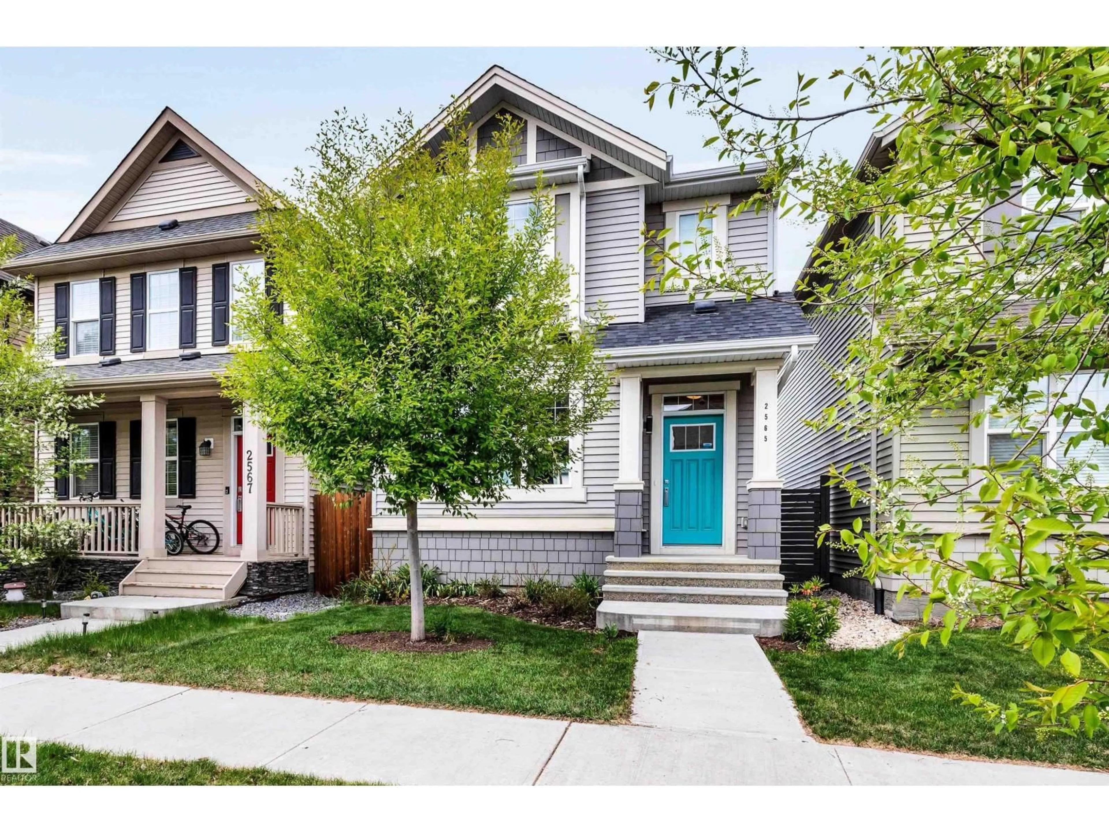 Home with vinyl exterior material, street for 2565 COUGHLAN RD, Edmonton Alberta T6W2Z6