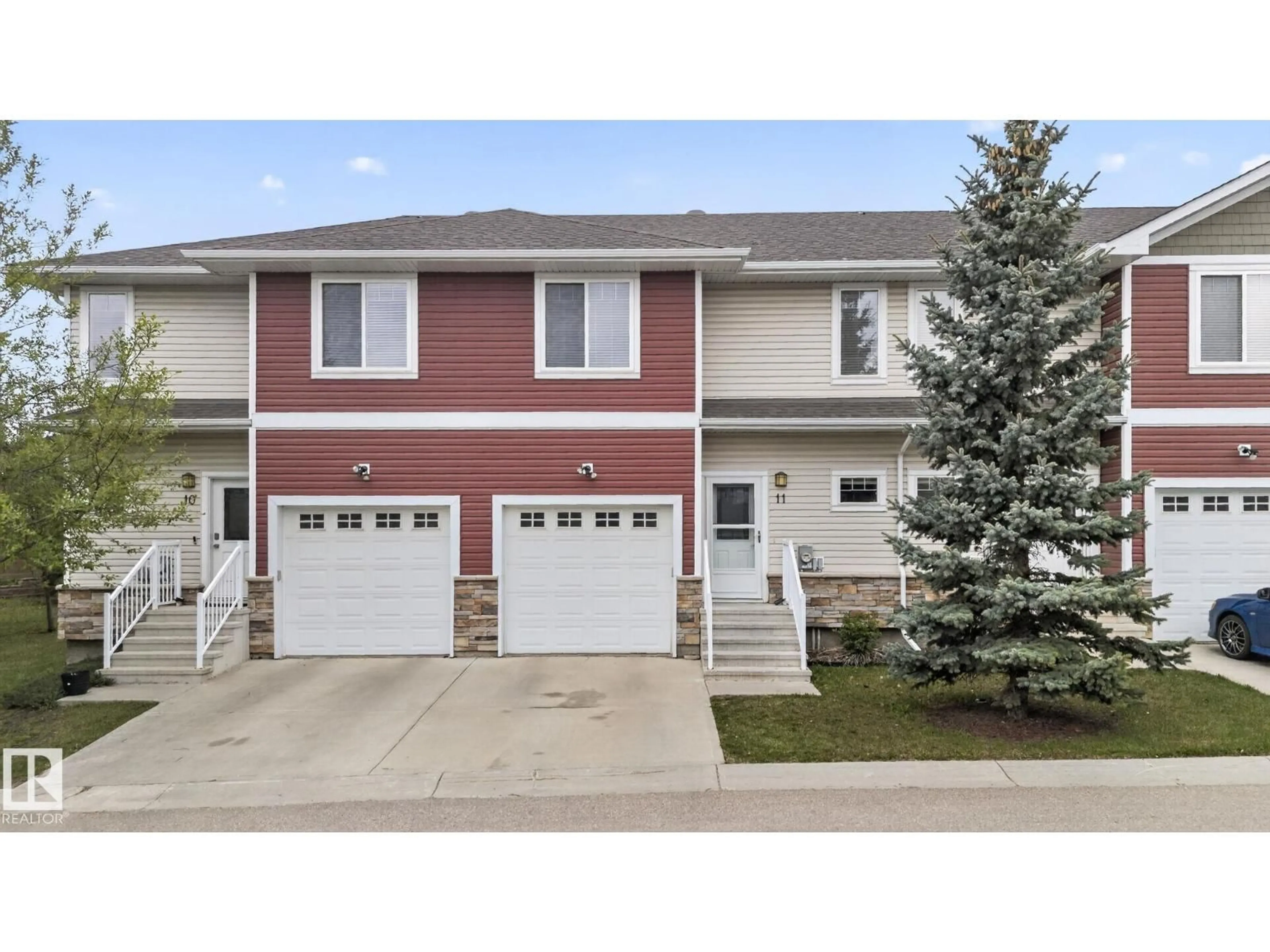 Home with vinyl exterior material, street for #11 - 450 MCCONACHIE WY, Edmonton Alberta T5Y0S8