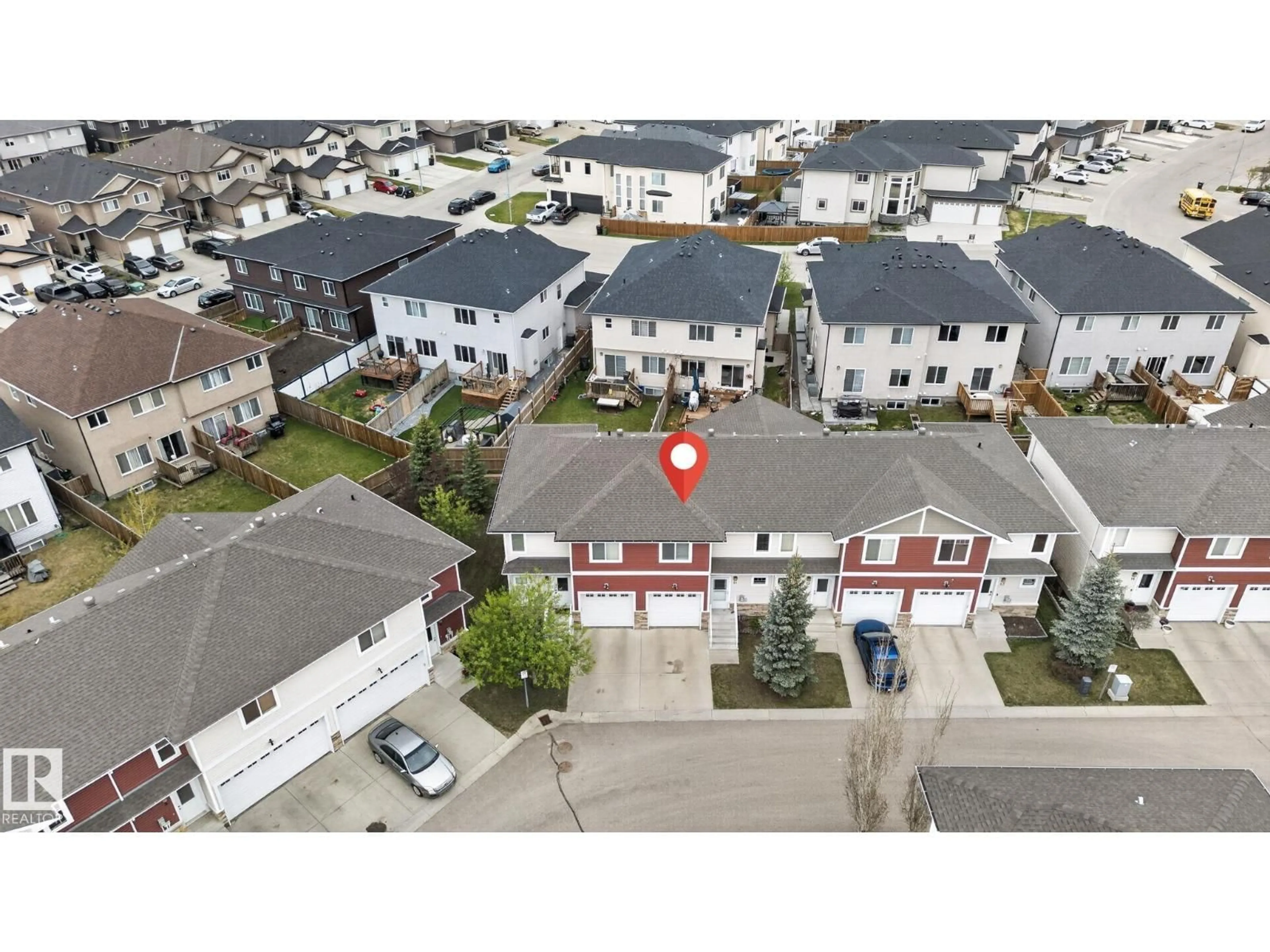 A pic from outside/outdoor area/front of a property/back of a property/a pic from drone, street for #11 - 450 MCCONACHIE WY, Edmonton Alberta T5Y0S8